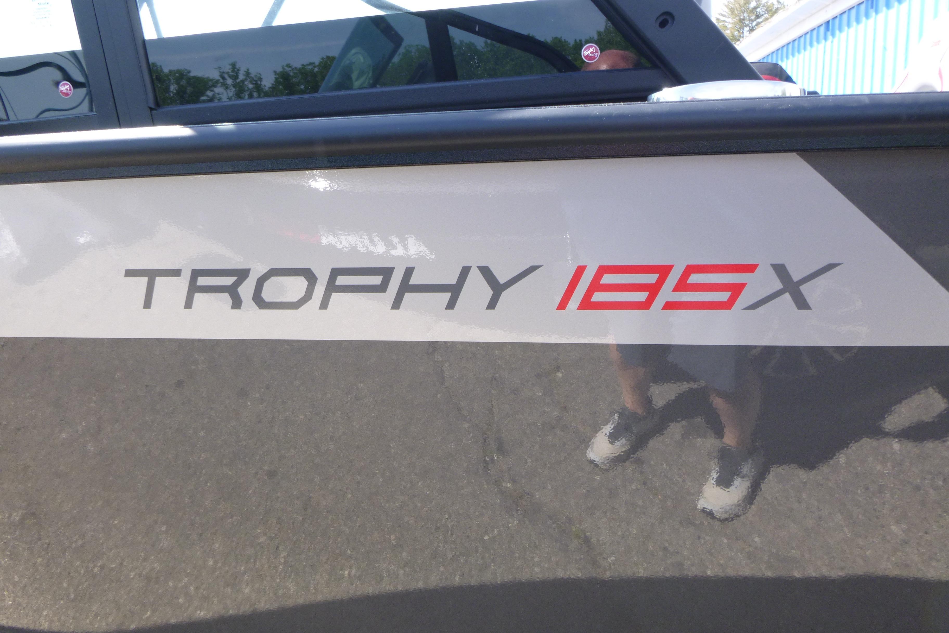 2025 Alumacraft Trophy 185X Sport boat logo on side panel.