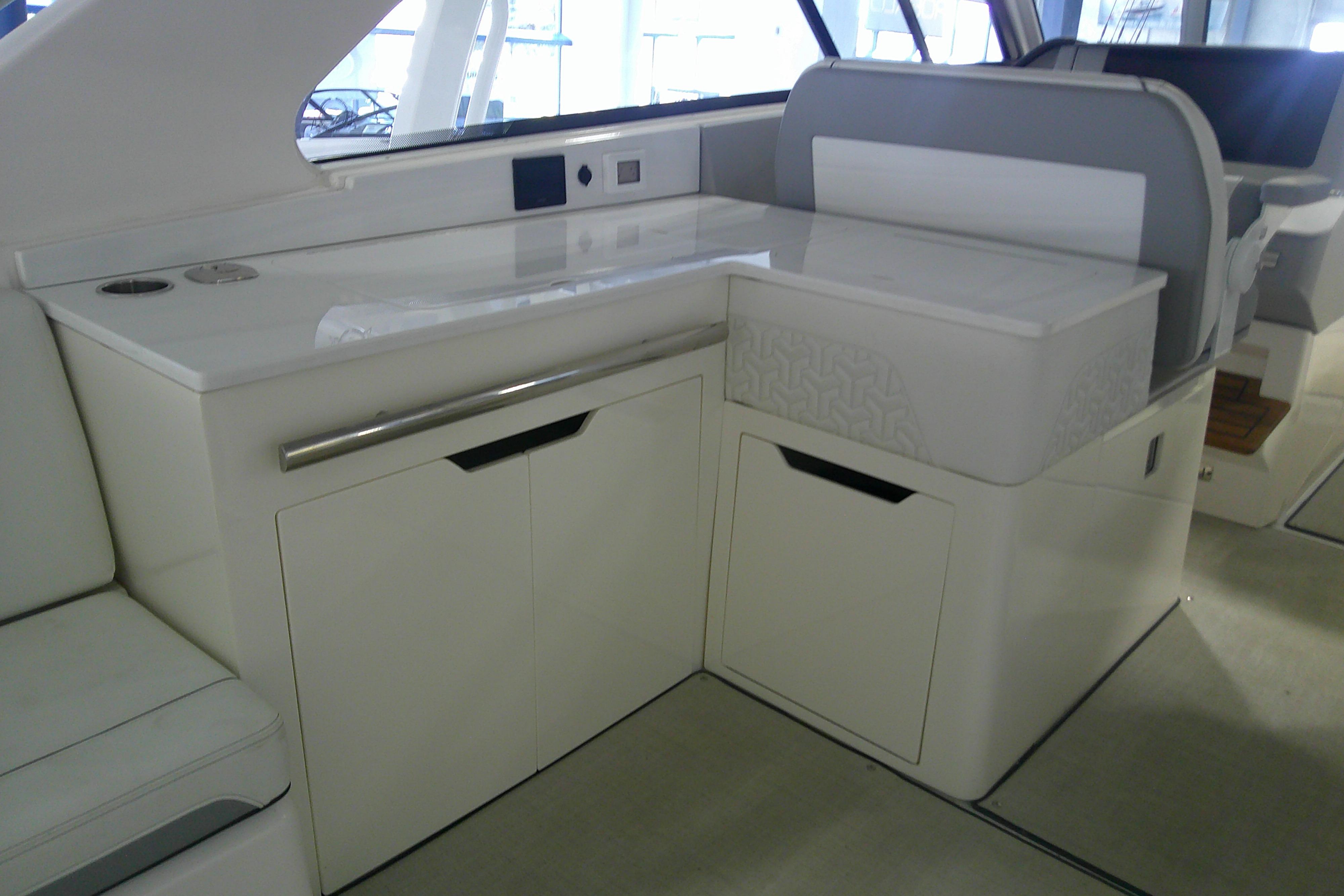 2023 Regal LX36 yacht interior with sleek white cabinetry and modern design elements.
