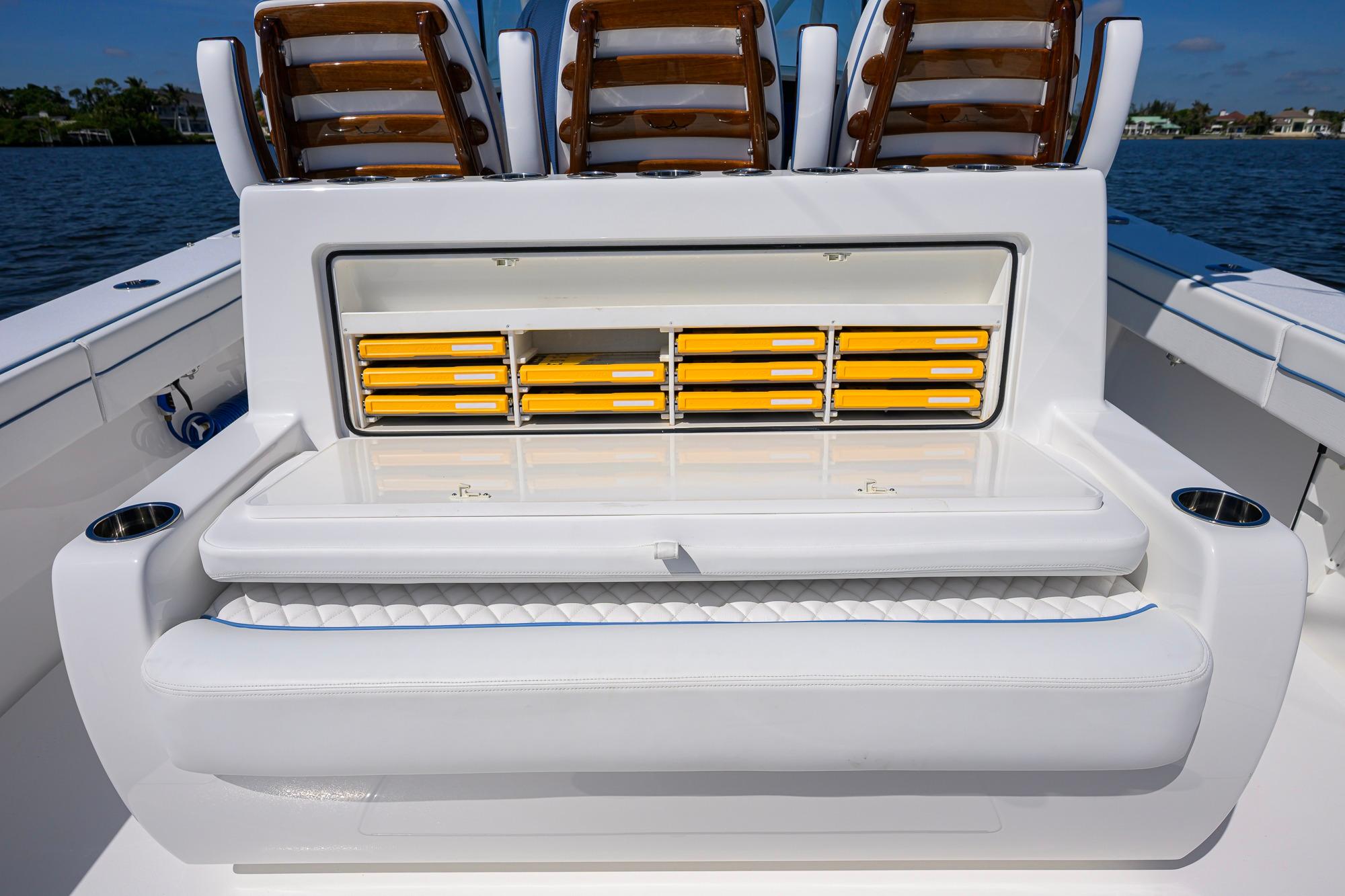 2025 Valhalla Boatworks V-41 interior with seating and storage compartments.