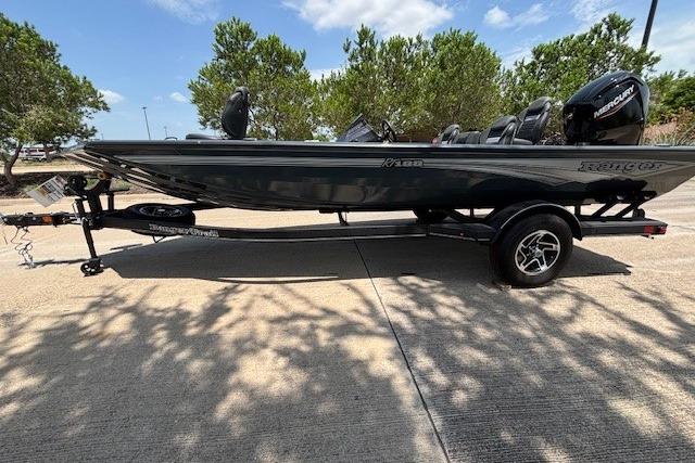 2026 Ranger RT188 boat on trailer, parked outdoors under clear sky.