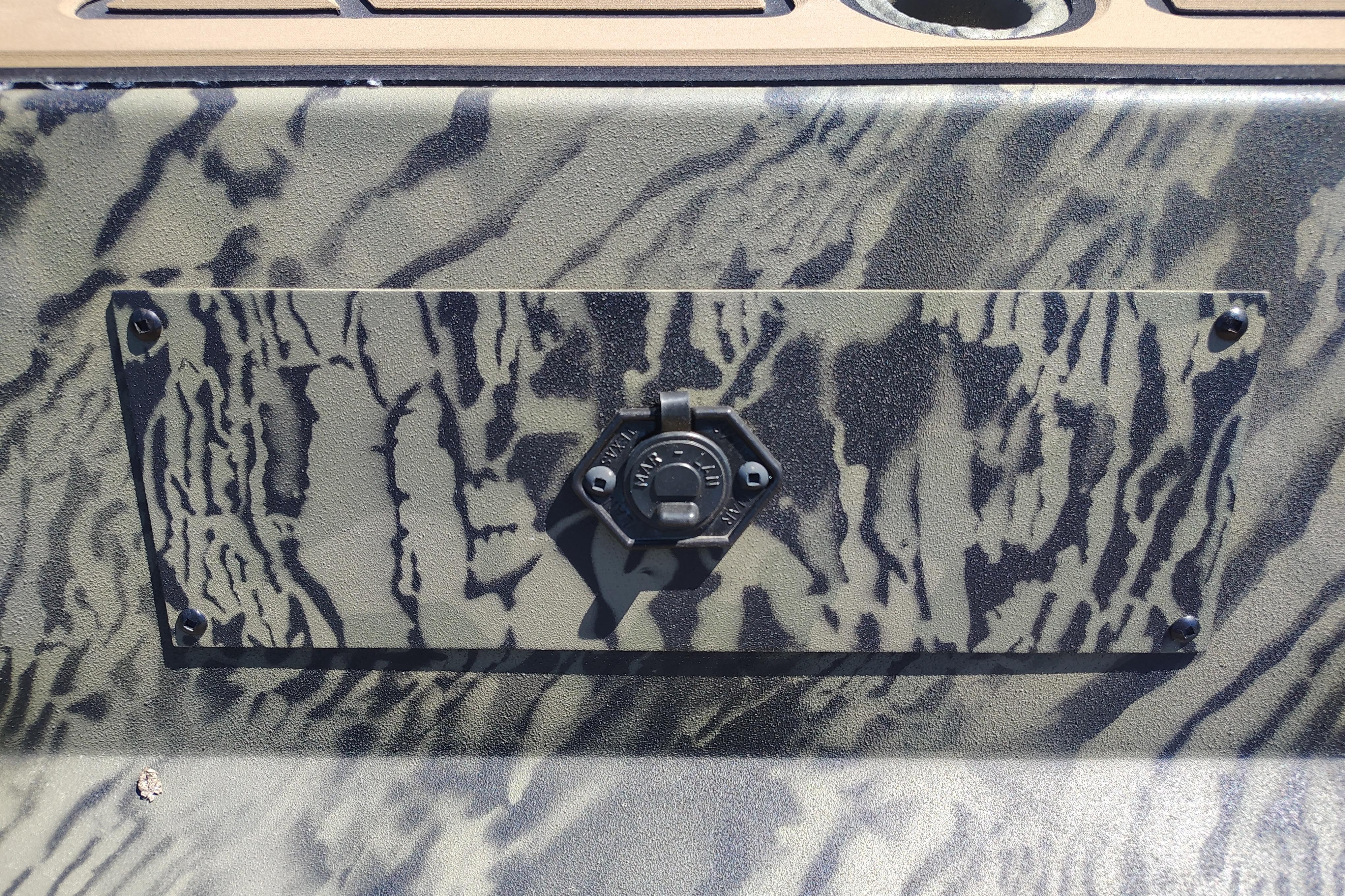 Camouflage panel on 2026 Tracker Grizzly 1650 T Prairie Wings Edition boat.