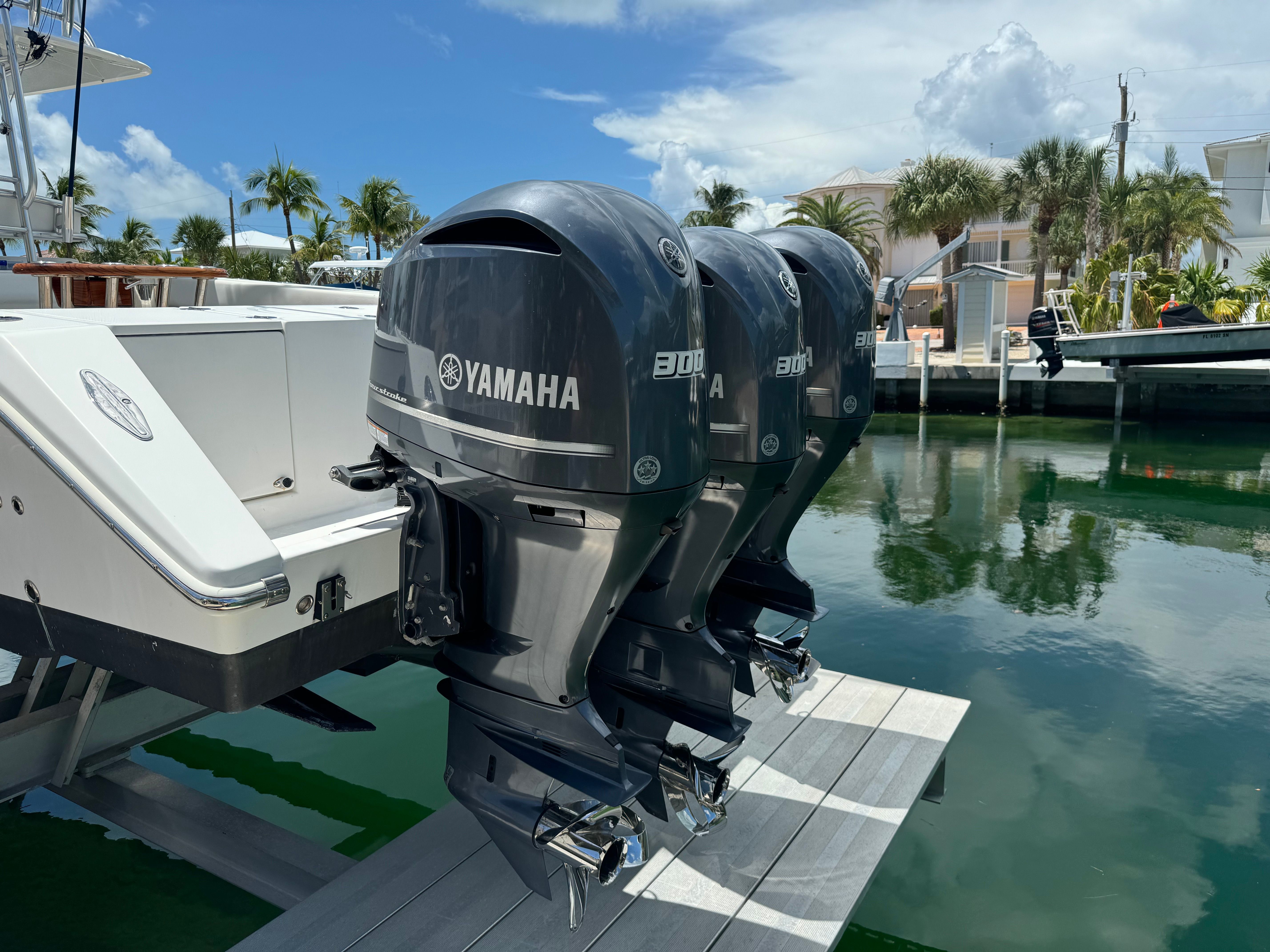 Three Yamaha outboard motors on a 2019 Venture CC boat.