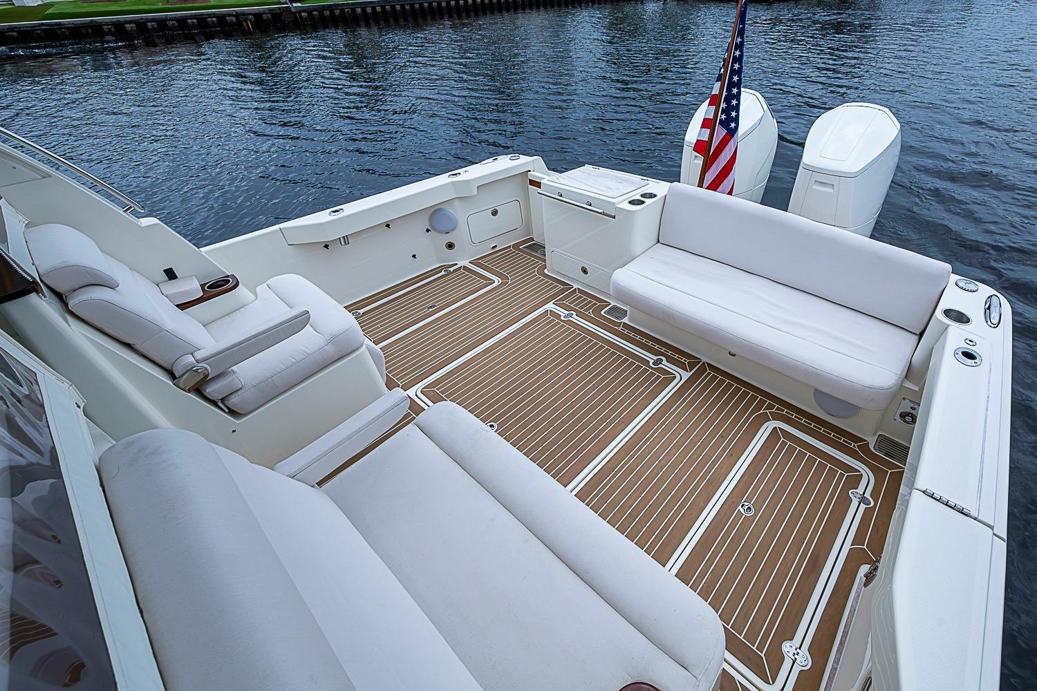 2023 Hinckley Sport Boat 40 X with spacious seating and elegant deck design.