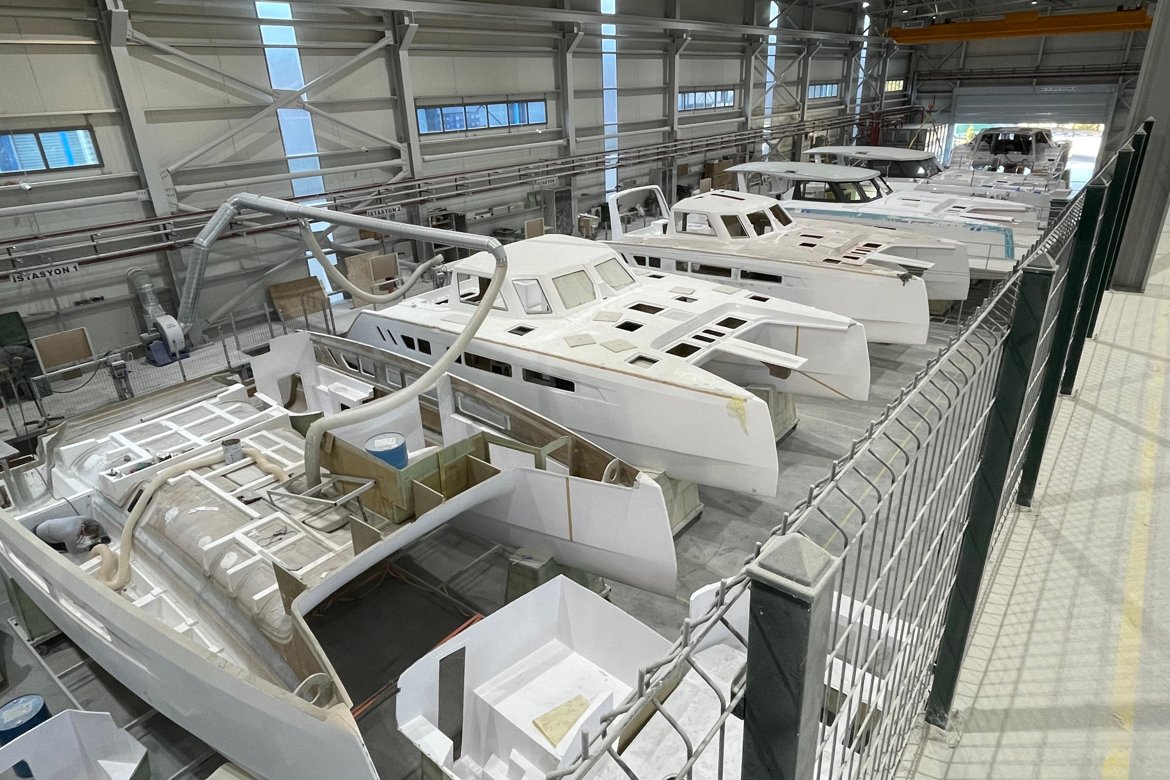 Factory assembly of 2027 Seawind 1170 catamarans in progress.