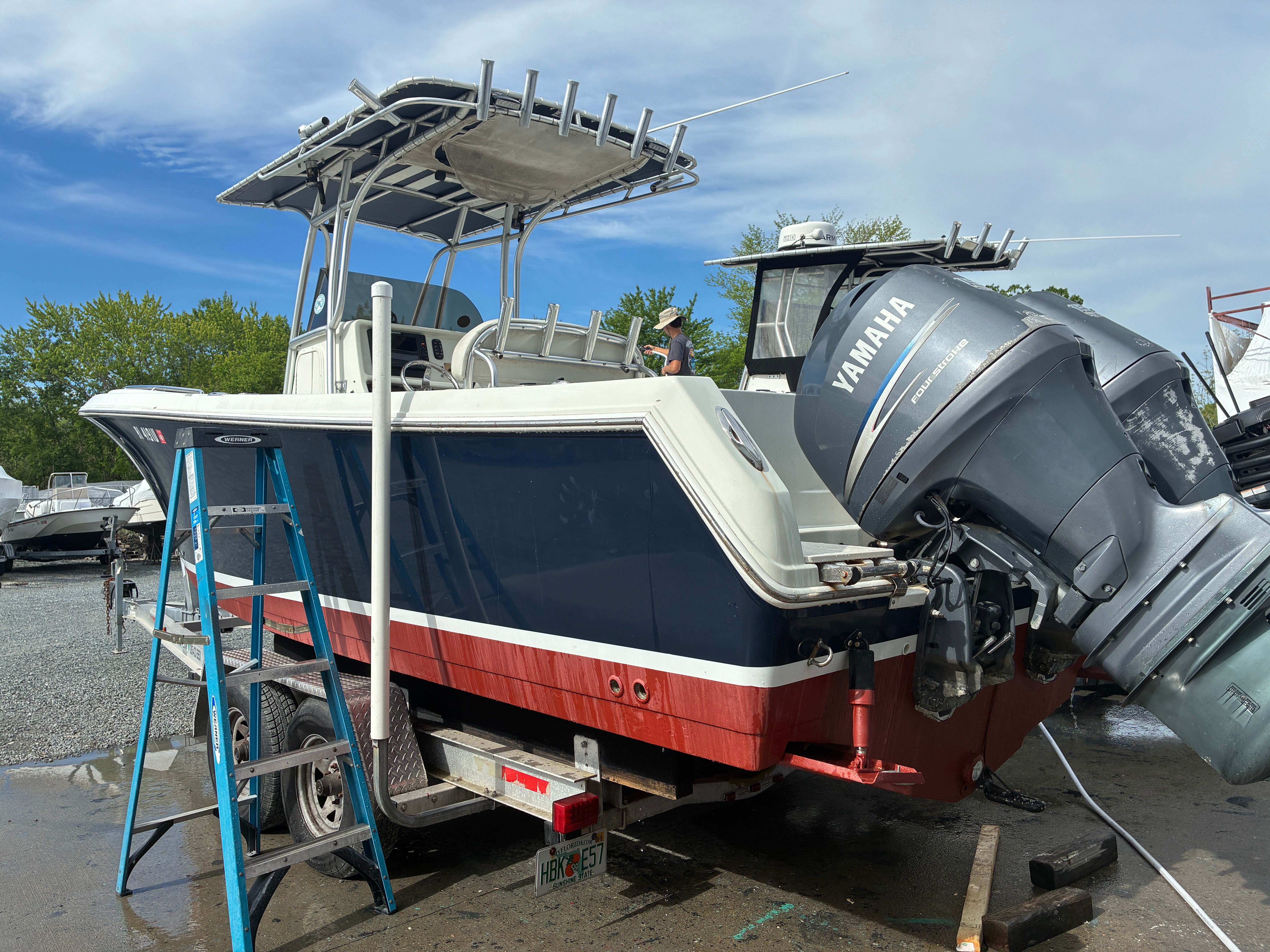 2007 Sailfish 2660 boat with Yamaha engine on trailer.