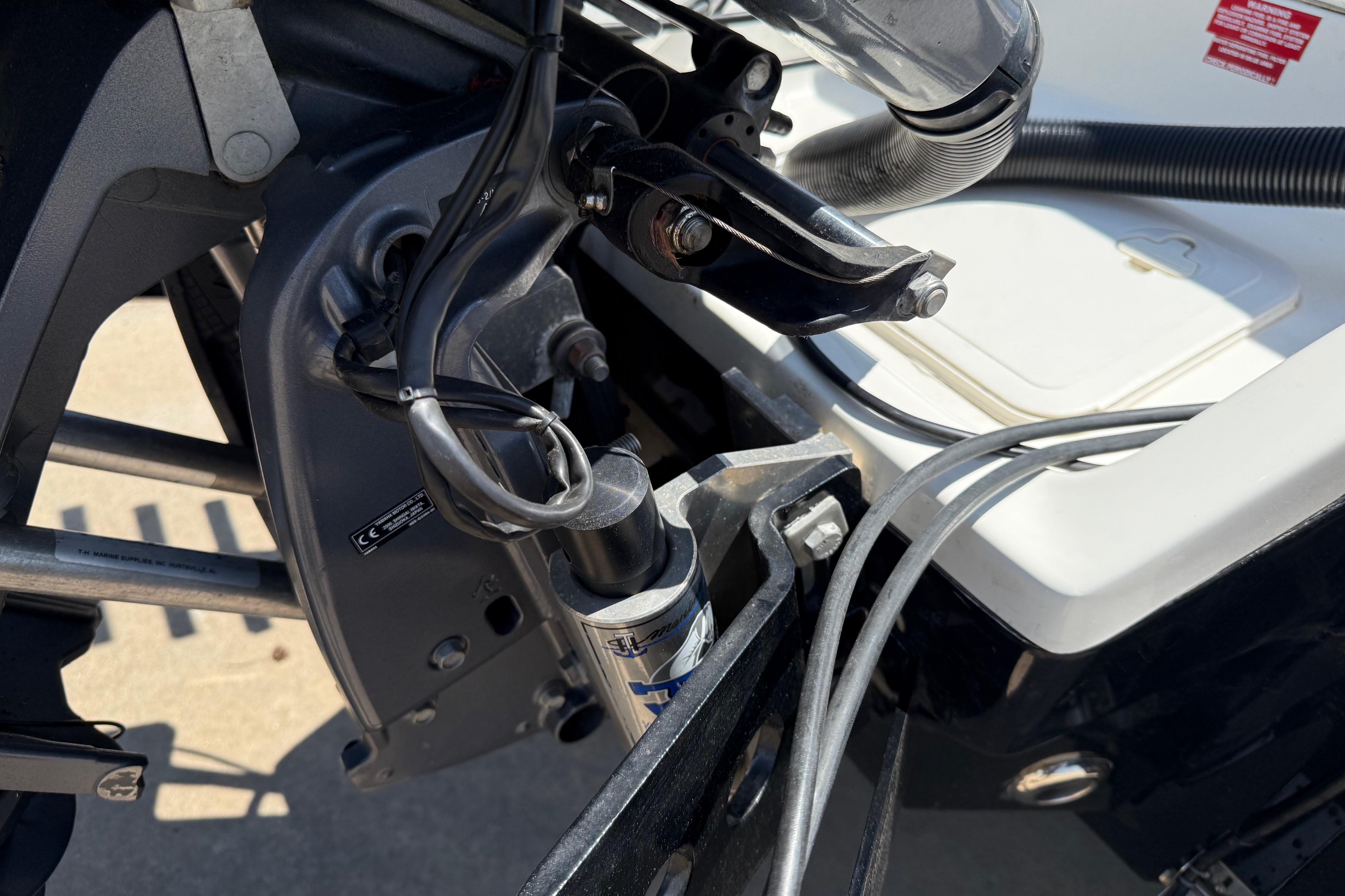 Close-up of 2019 Key West 230 Bay Reef boat engine components and wiring.