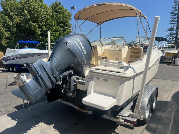 2019 Scout 210 Dorado boat with Yamaha outboard motor on trailer.