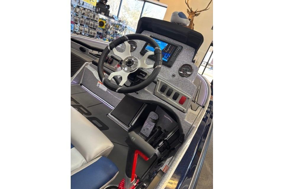 2026 Nitro Z19 XL boat dashboard with steering wheel and control panel.