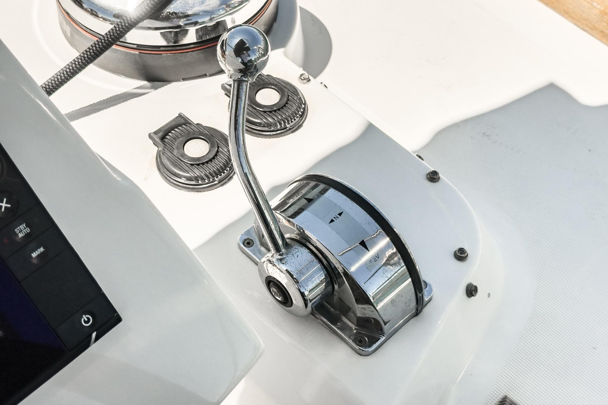 Close-up of 2017 Beneteau Sense 50 yacht throttle control lever.