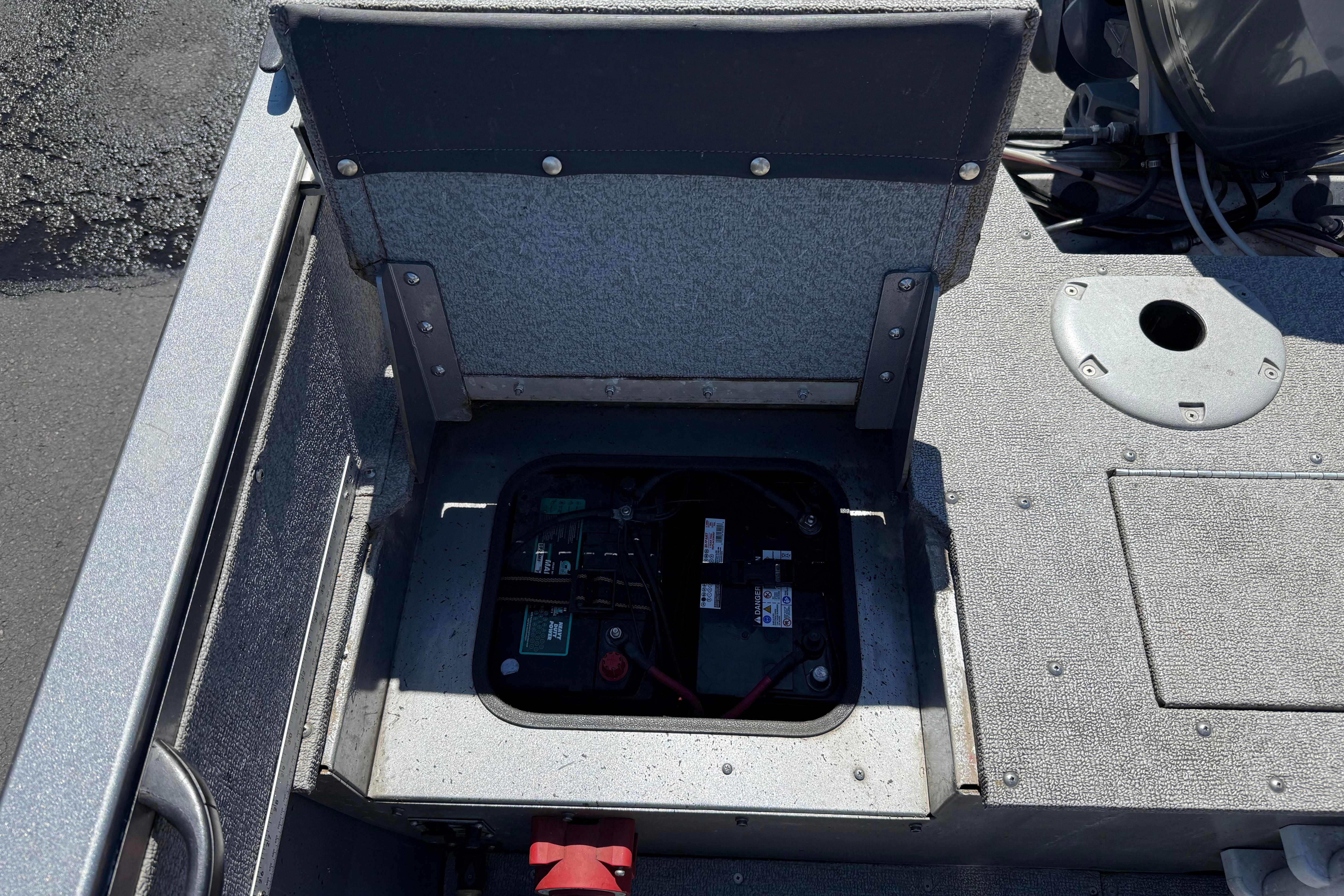 2016 Crestliner 1700 Vision boat battery compartment with open hatch.