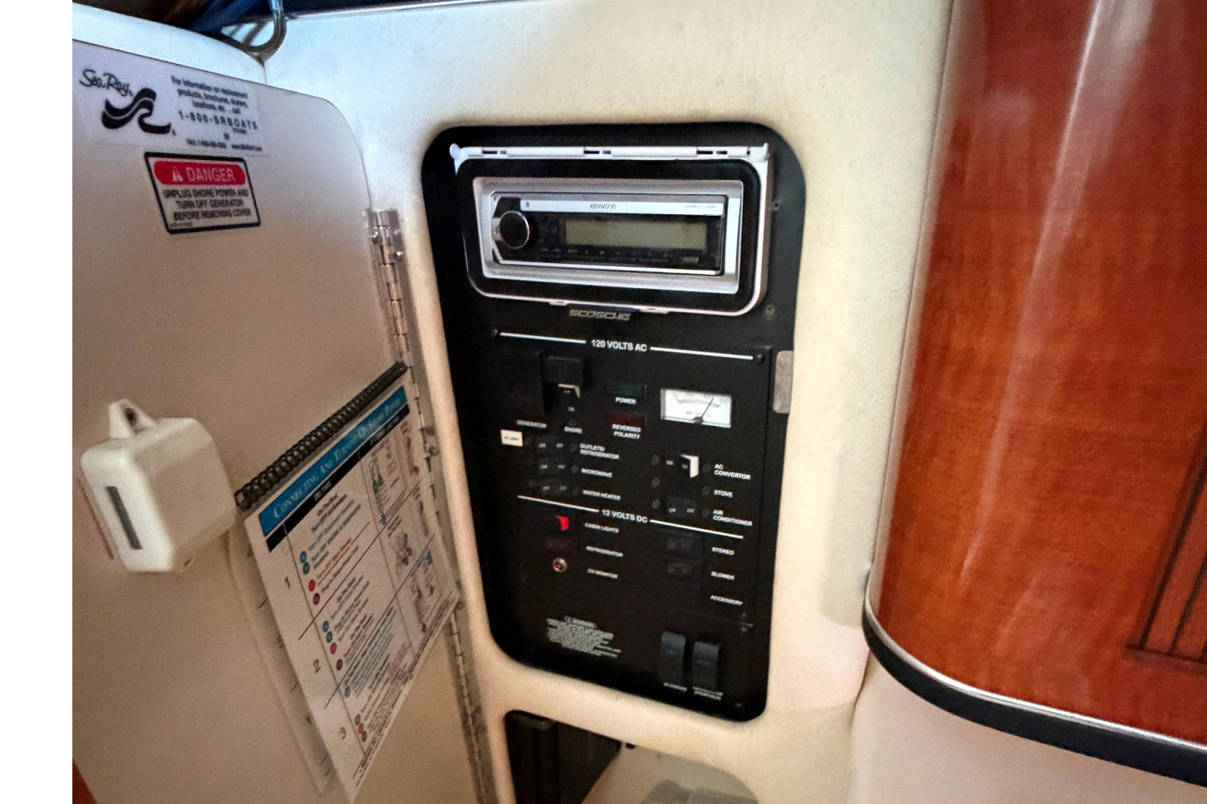 Control panel of a 2004 Sea Ray Sundancer 260 boat interior.