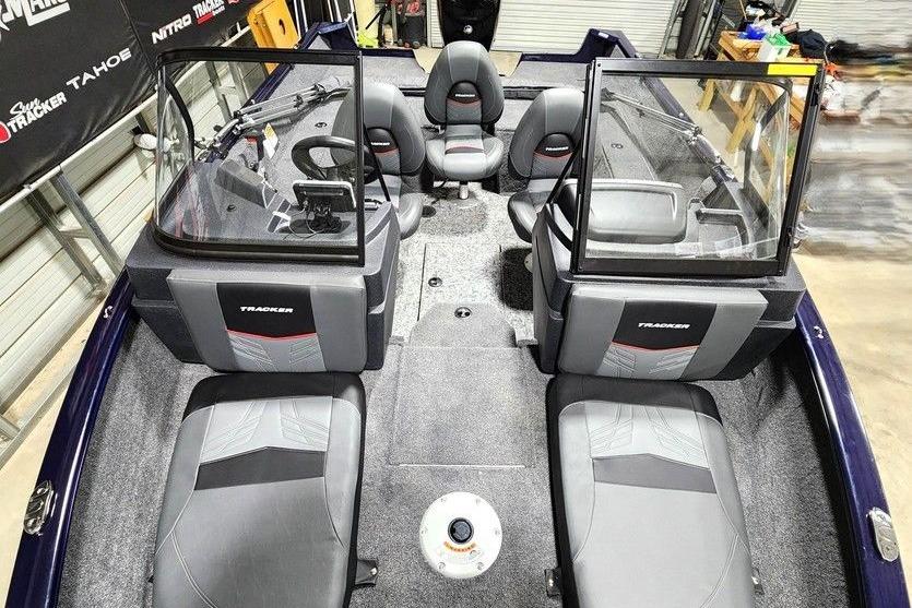 2026 Tracker Pro Guide V-175 Combo boat interior with seating and dashboard.