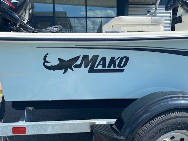 2024 Mako Pro Skiff 15 CC boat with logo on trailer.