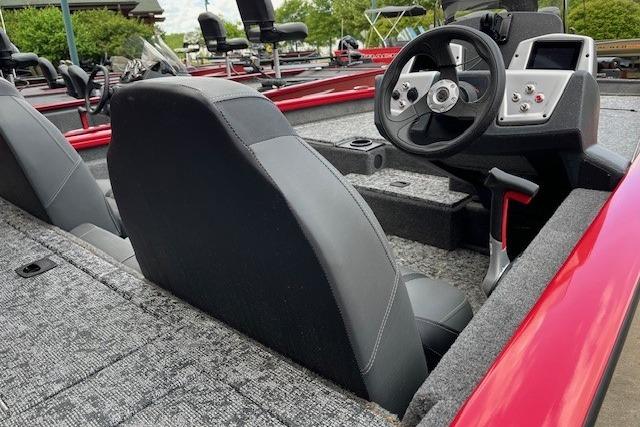 2026 Tracker Pro Team 175 boat interior with steering wheel and seating.