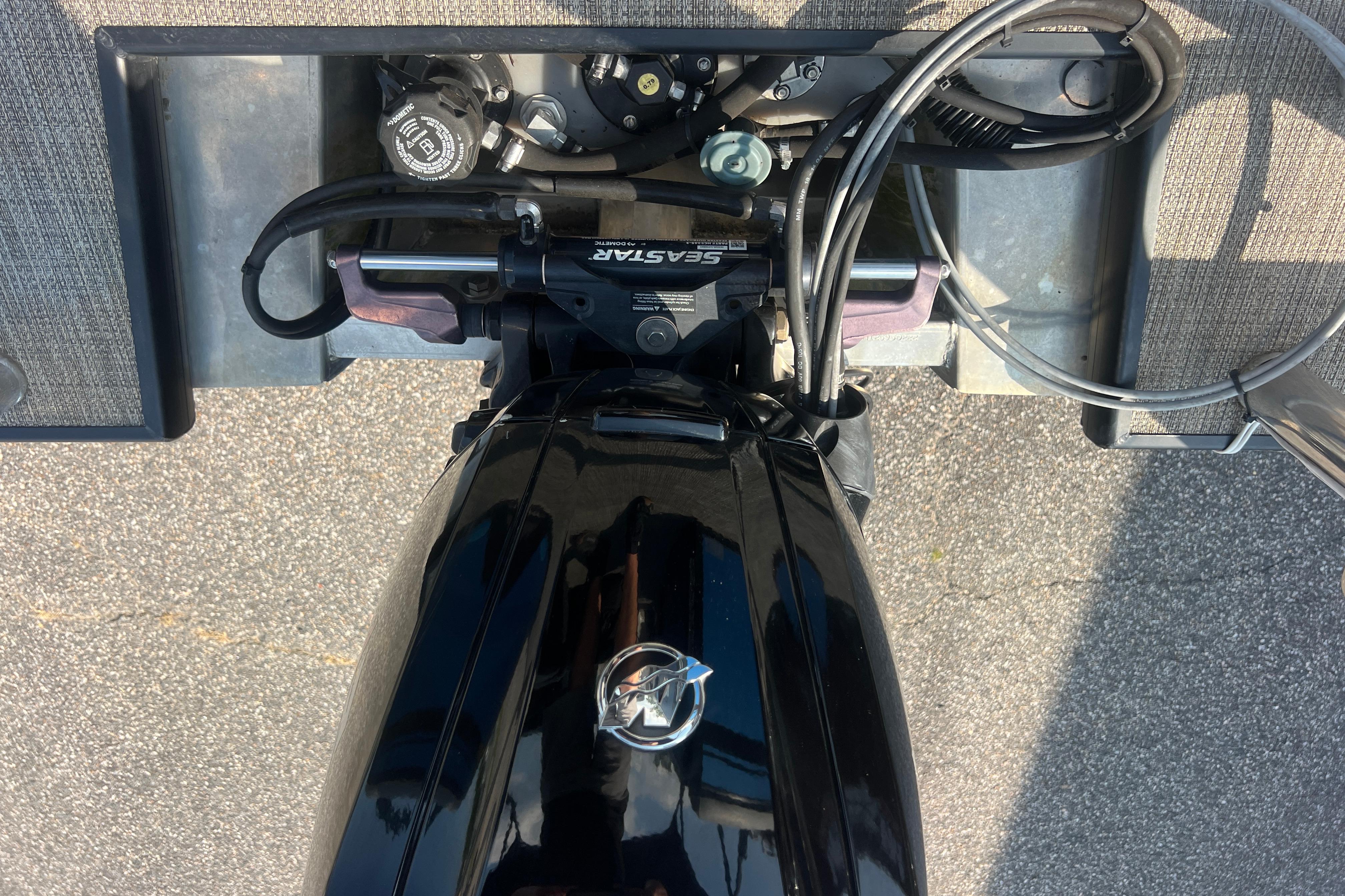 Top view of a 2022 Viaggio Lago V-U 22 boat engine and controls.