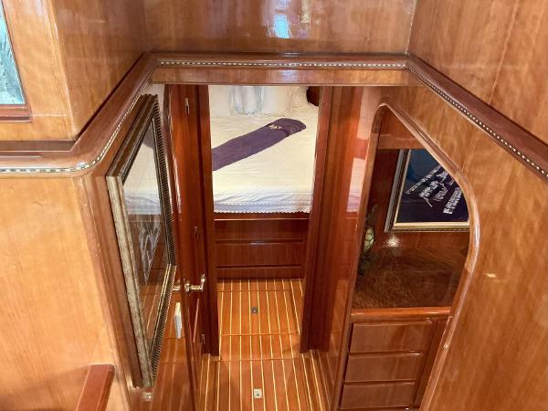 Interior view of 2000 Novatec Islander 55 yacht with polished wood finish.