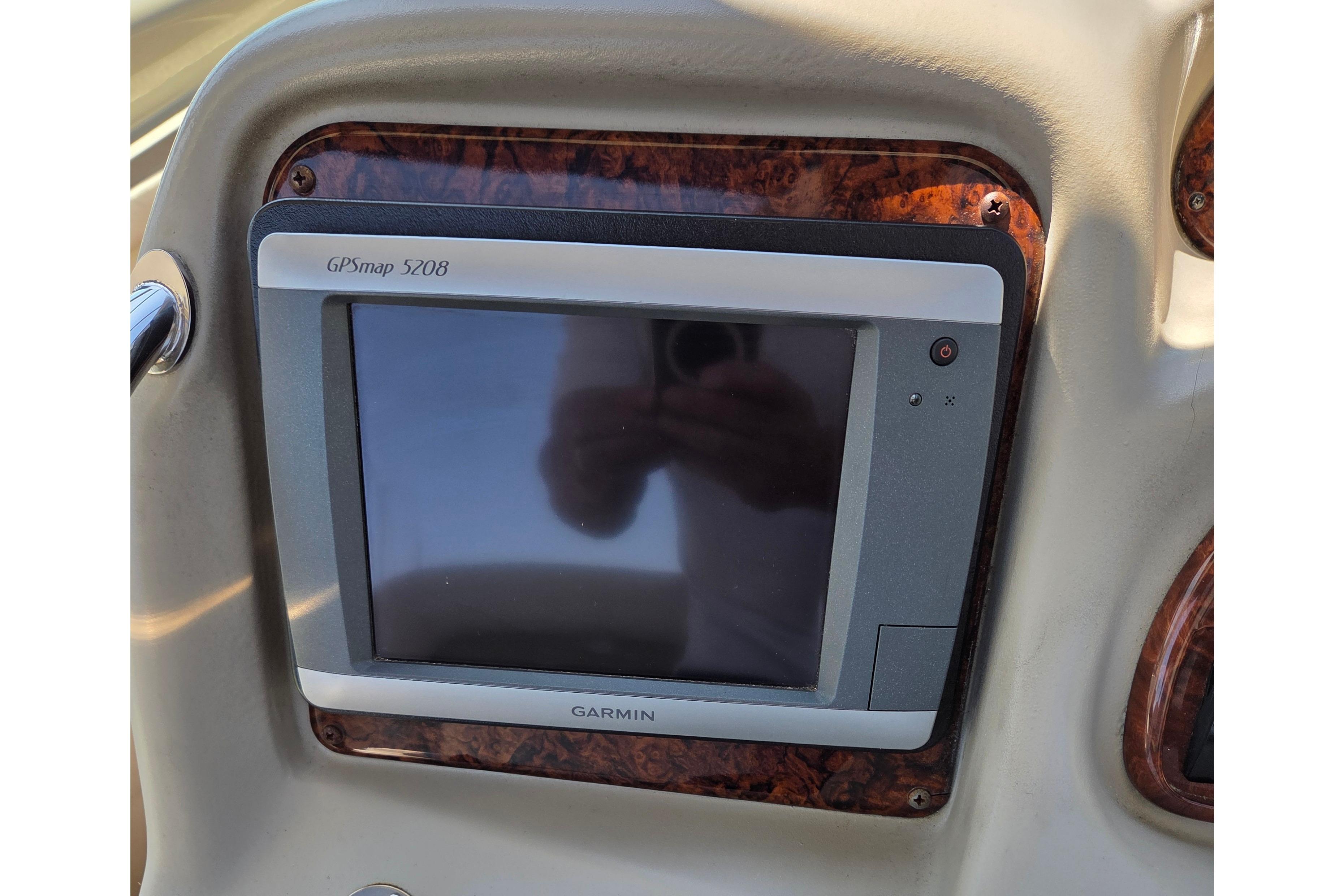 Garmin GPSmap 5208 on 2006 Sea Ray Sundancer 320 dashboard.
