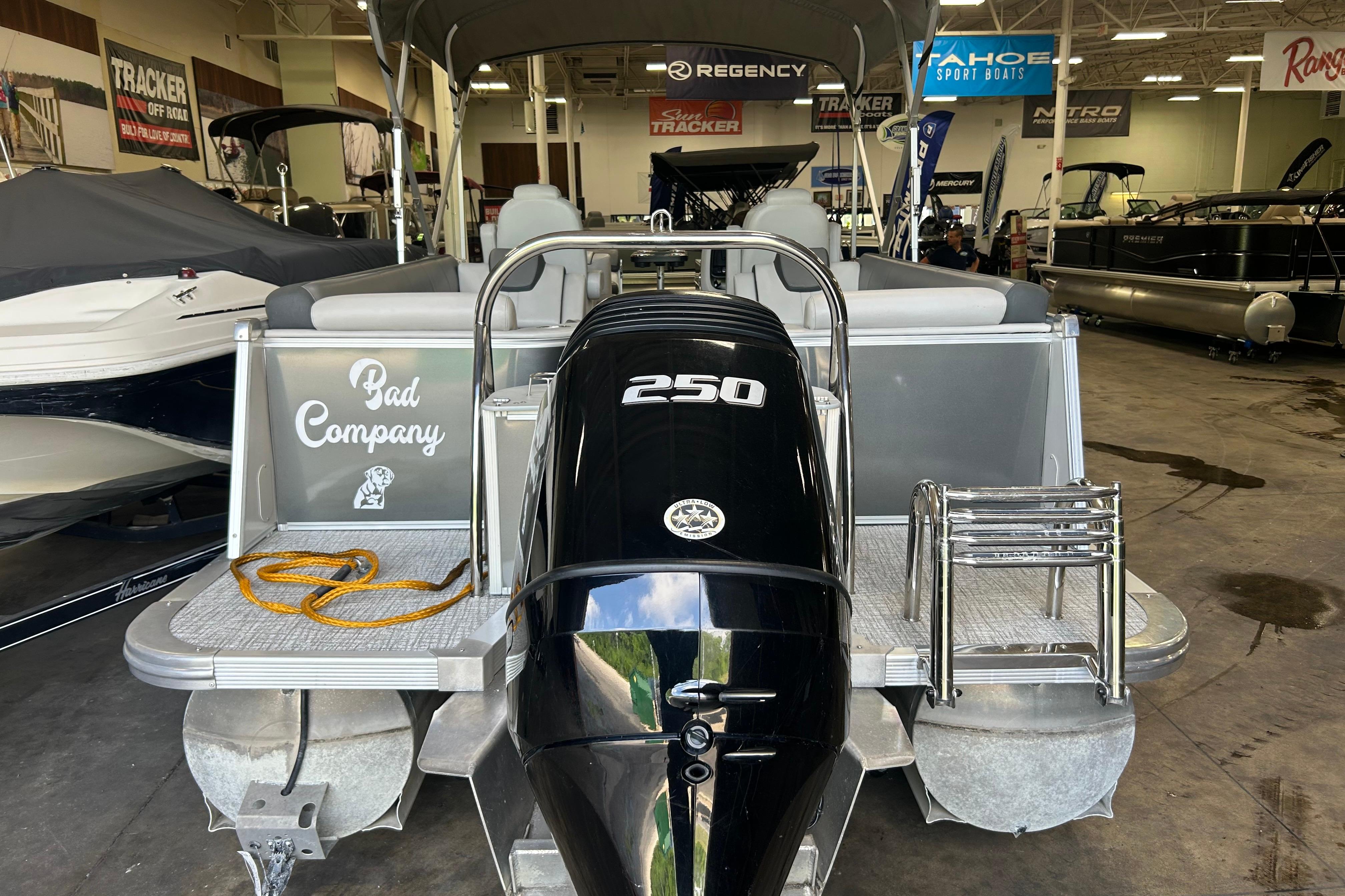 2022 Tahoe Pontoon Cascade Quad Lounger with 250 HP engine in showroom.