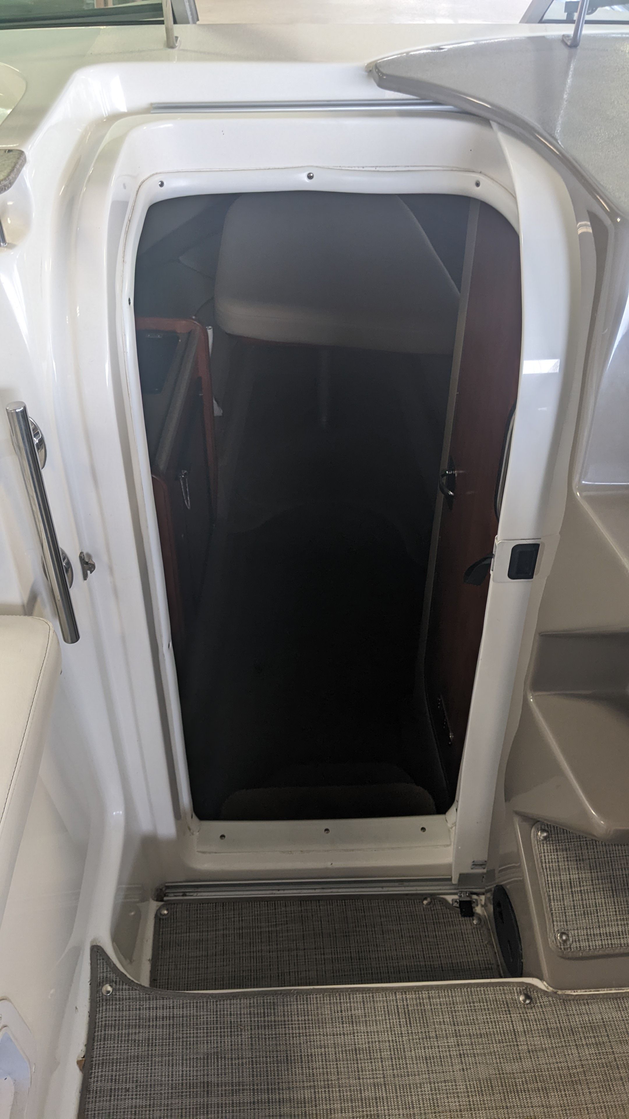 Entrance to cabin of a 2006 Rinker 250 EC boat.