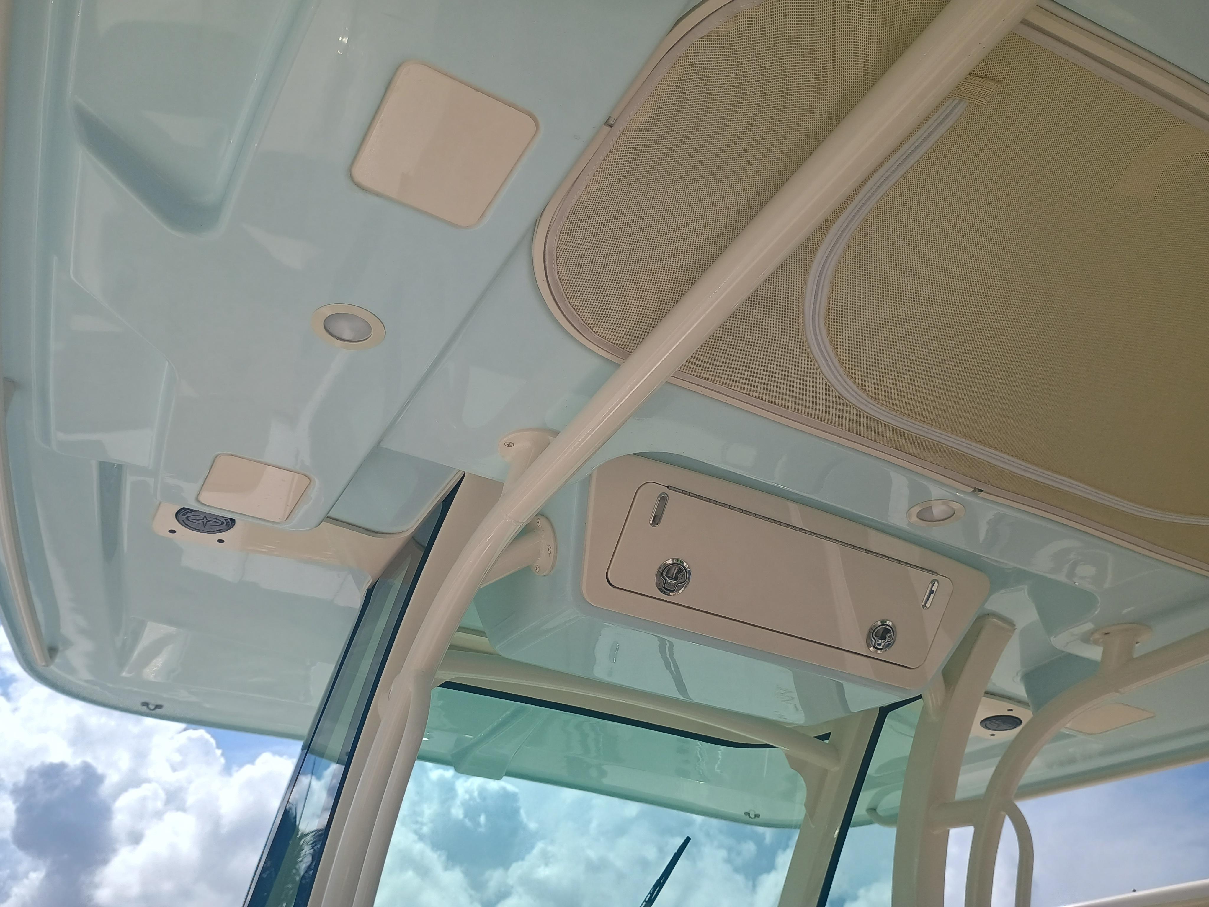 2025 Grady-White Canyon 306 boat interior ceiling with storage compartments.