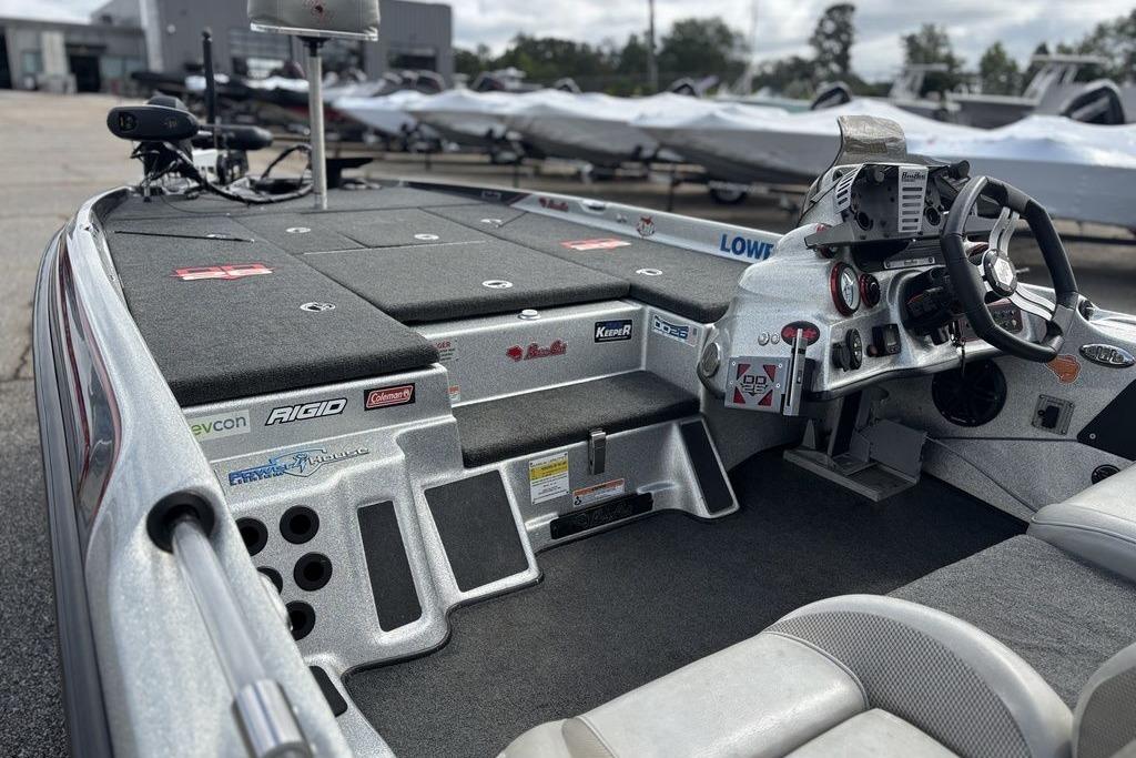 2020 Bass Cat Cougar FTD boat interior with steering wheel and control panel.