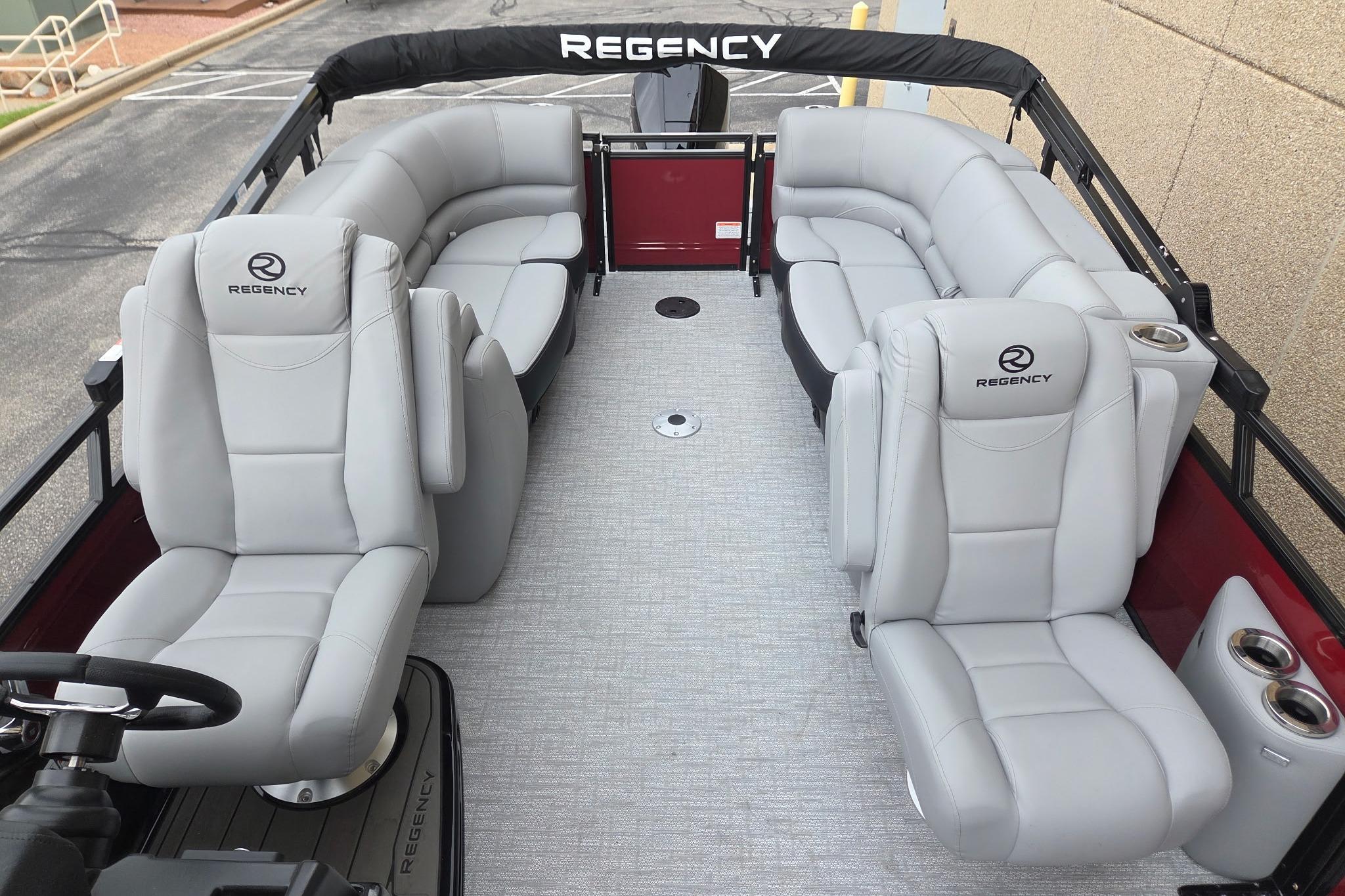 2026 Regency 230 DL pontoon boat with luxurious seating and modern design.