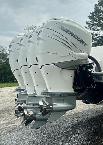 2008 SeaVee 390B with triple Mercury Verado outboard engines, parked outdoors.
