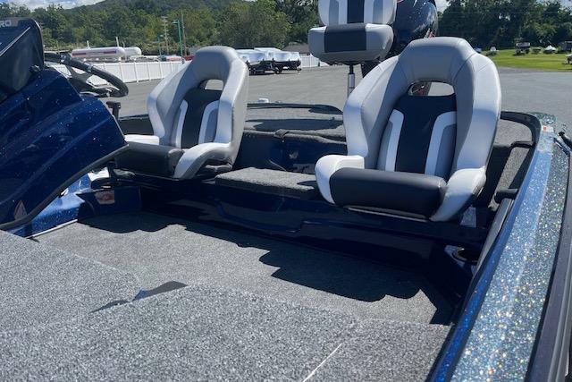 2026 Nitro Z18 Pro boat interior with dual seats and carpeted flooring.