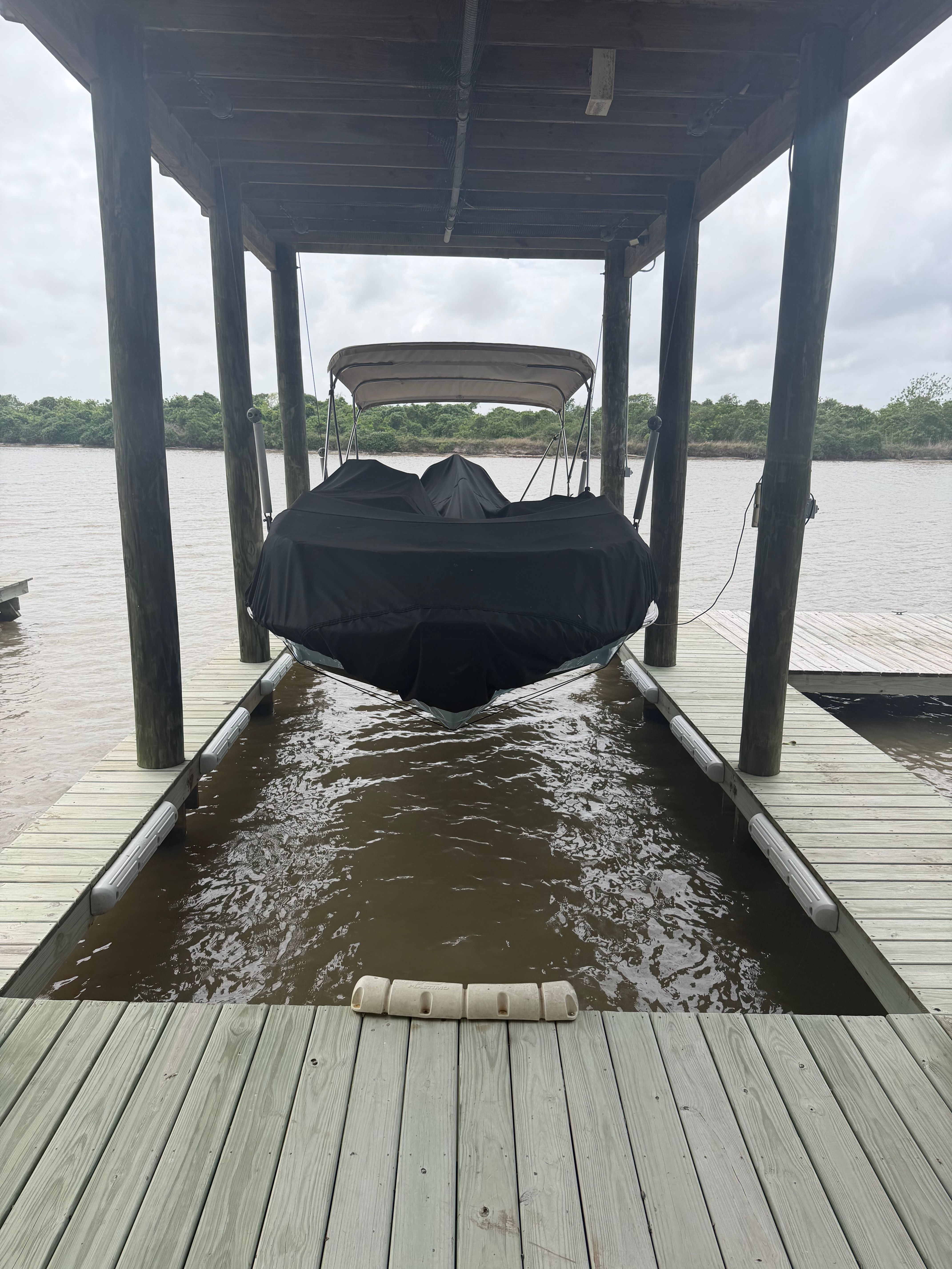Sea Pro Citation 2021 boat on a covered dock.