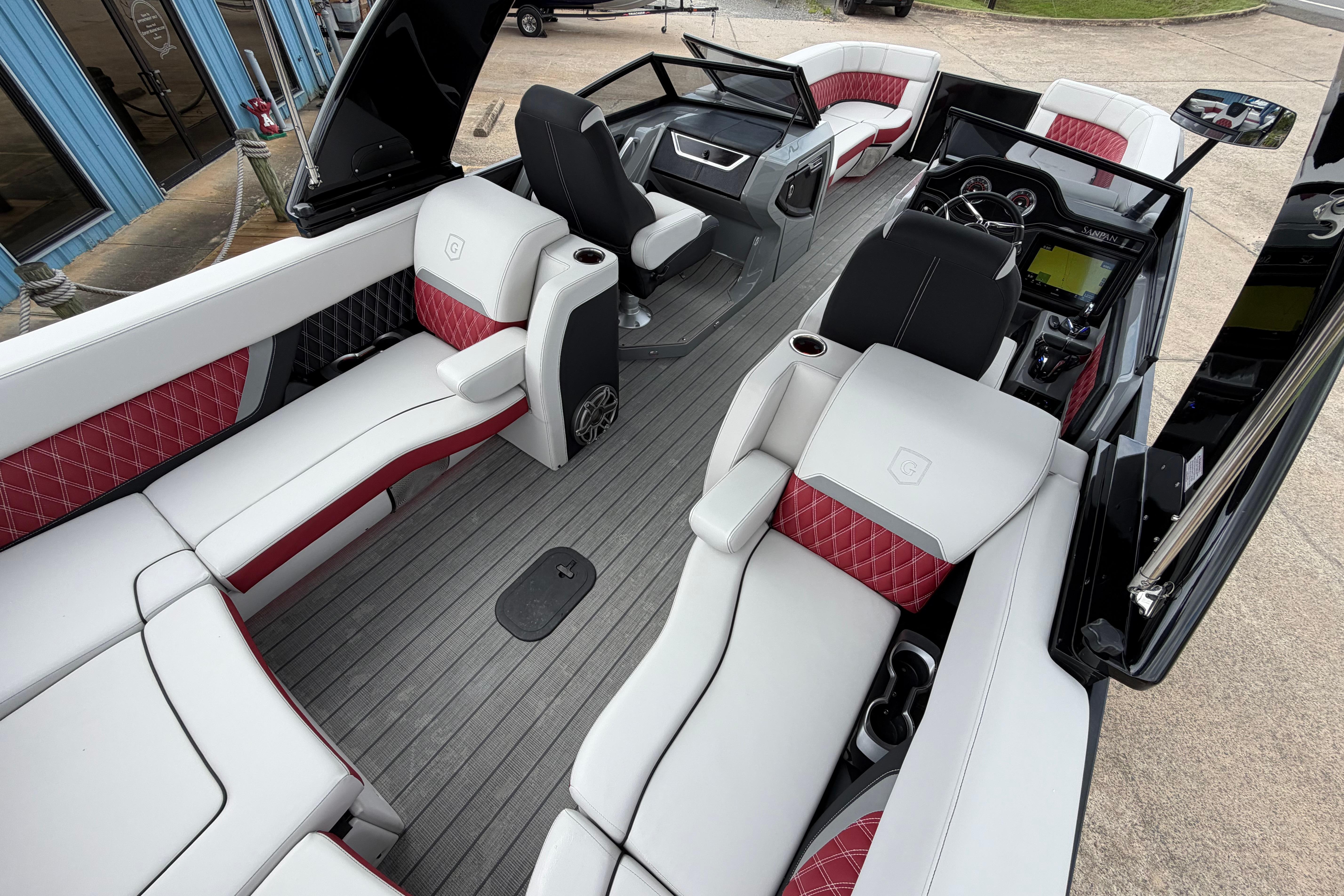 Luxurious interior of 2023 Godfrey Sanpan 2700 ULW Twin pontoon boat with stylish seating.