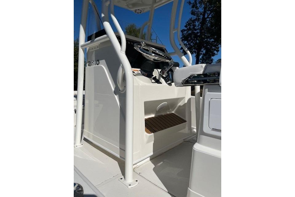 2025 Ranger 2510 Bay boat console with steering wheel and storage compartment.
