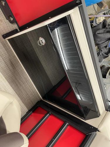 2025 Bentley Pontoons 200 Fish-N-Cruise interior detail with red and black accents.