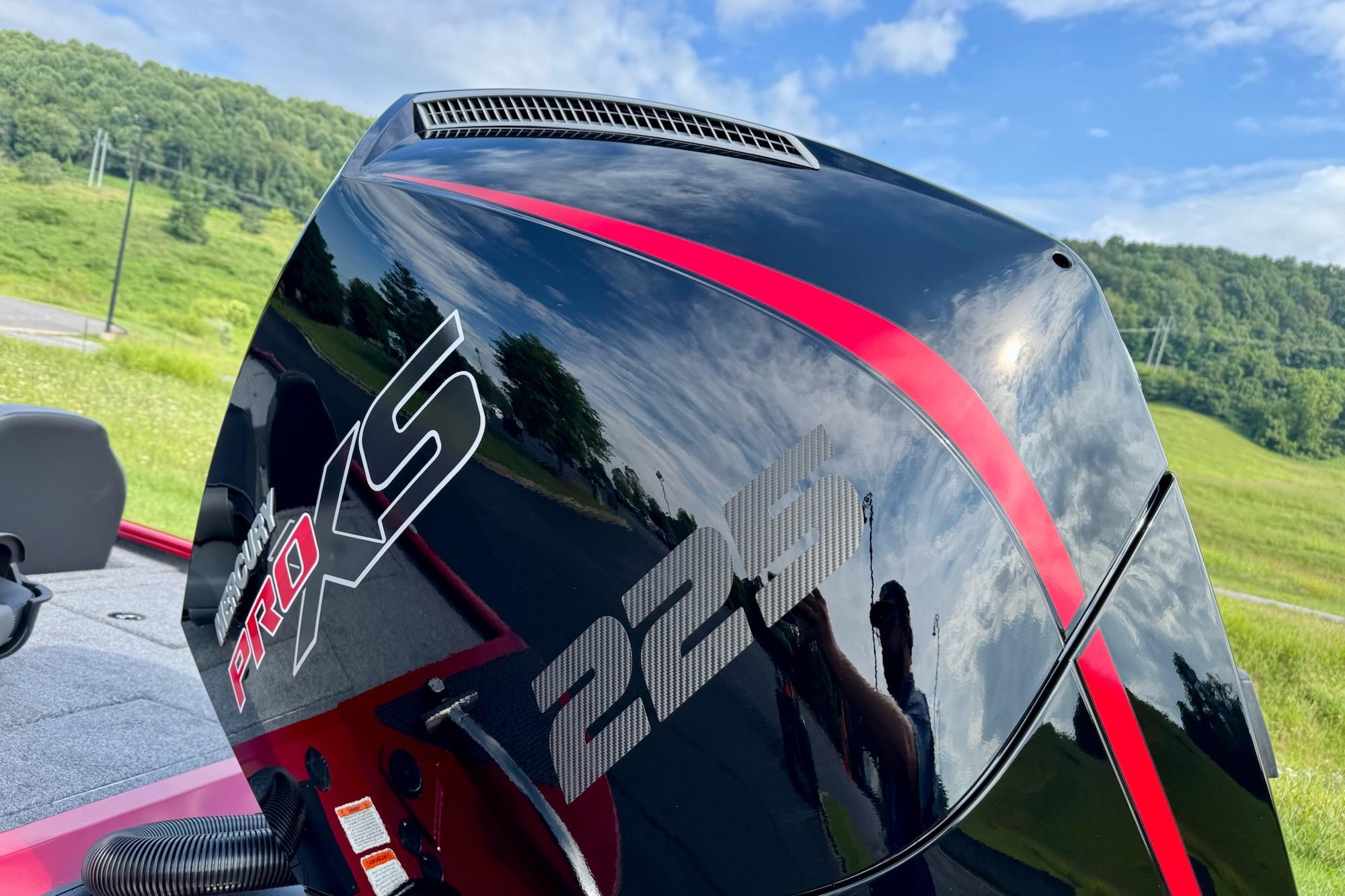 2026 Tracker Savage 215 boat engine with Mercury Pro XS branding, outdoors.