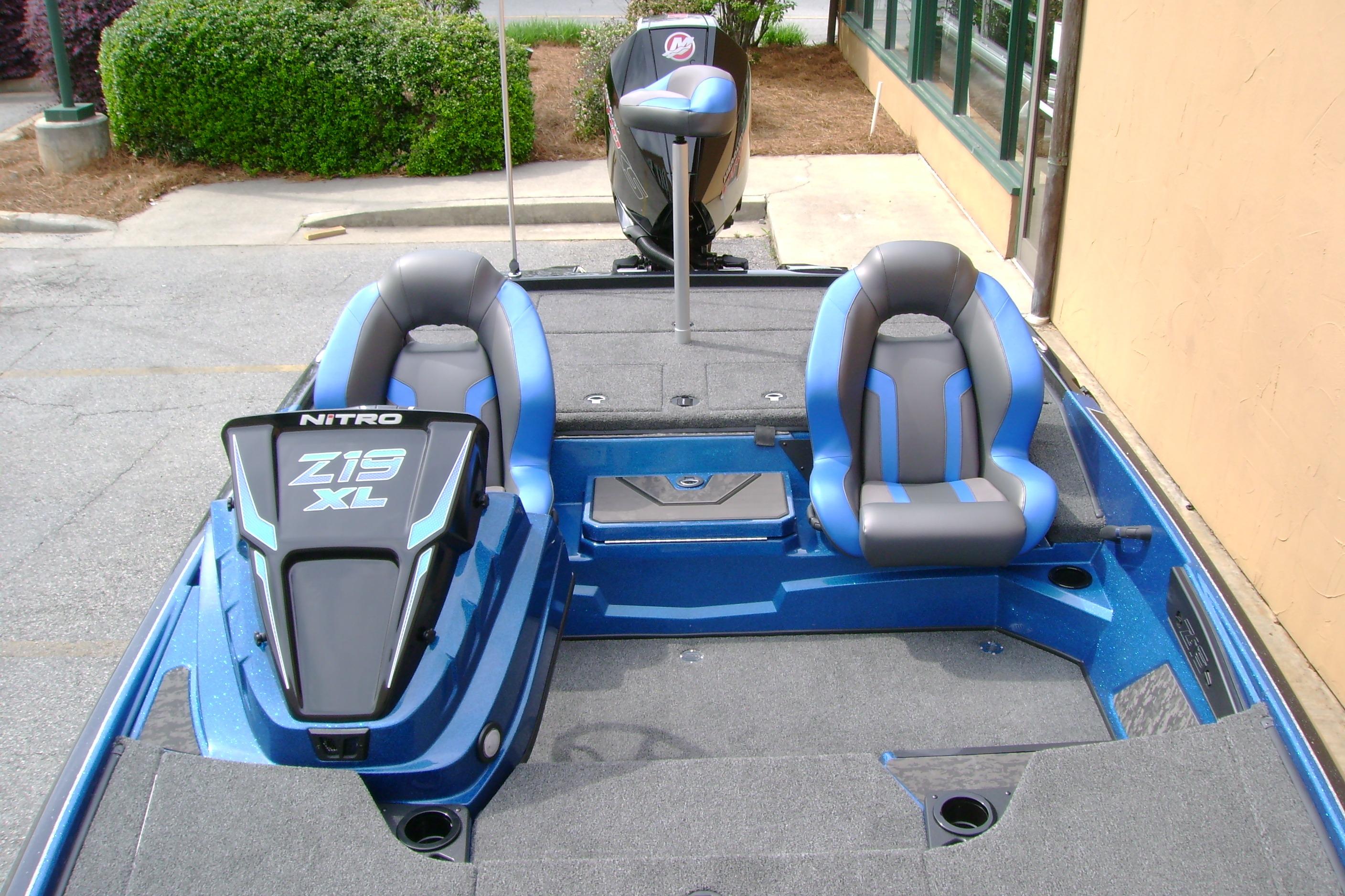 2026 Nitro Z19 XL boat interior with blue seats and sleek design.