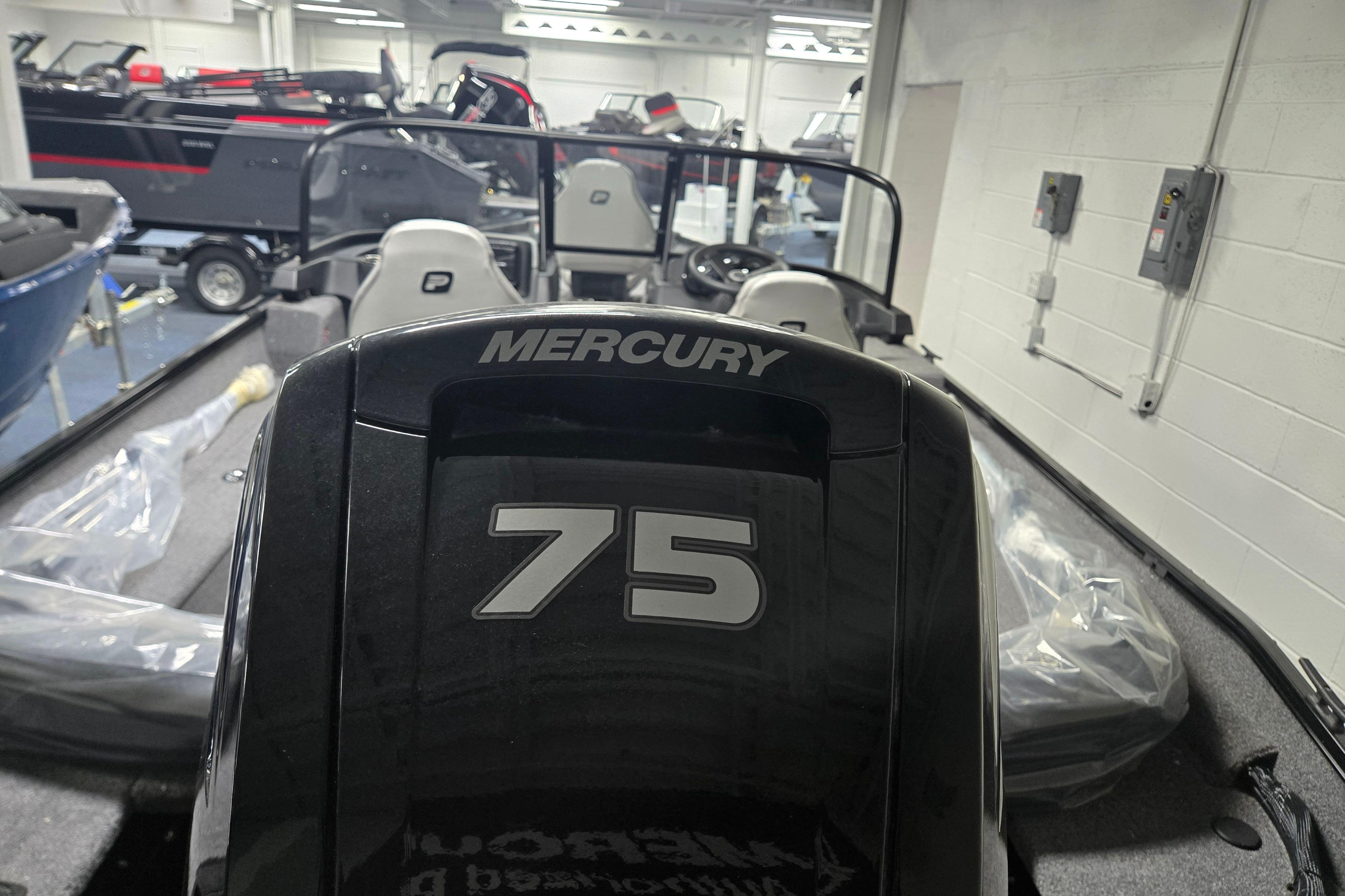 2026 Princecraft Holiday 162 WS MAX boat with Mercury 75 engine in showroom.