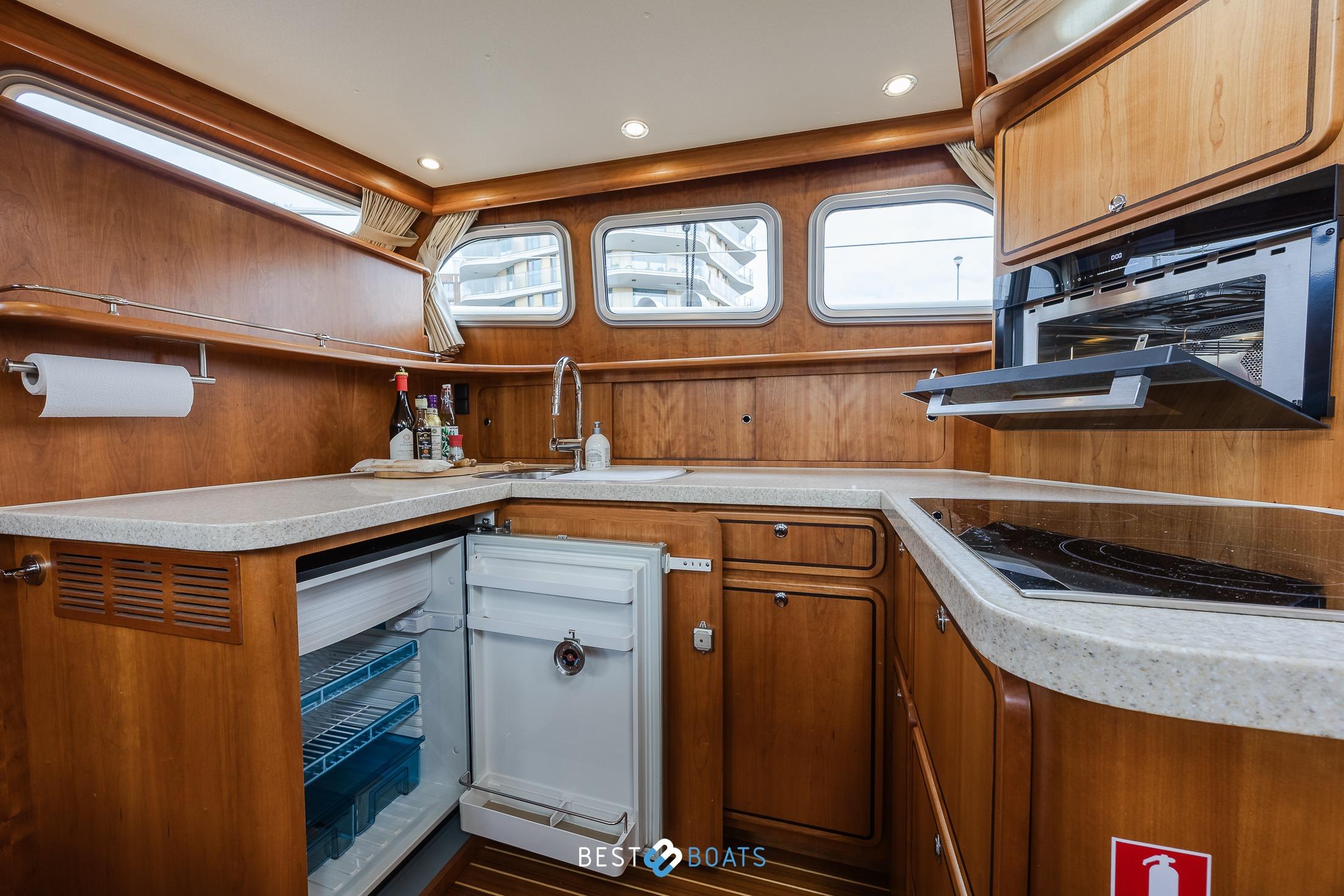 Luxurious kitchen interior of 2010 Linssen Grand Sturdy 470 AC Mark II Twin yacht.