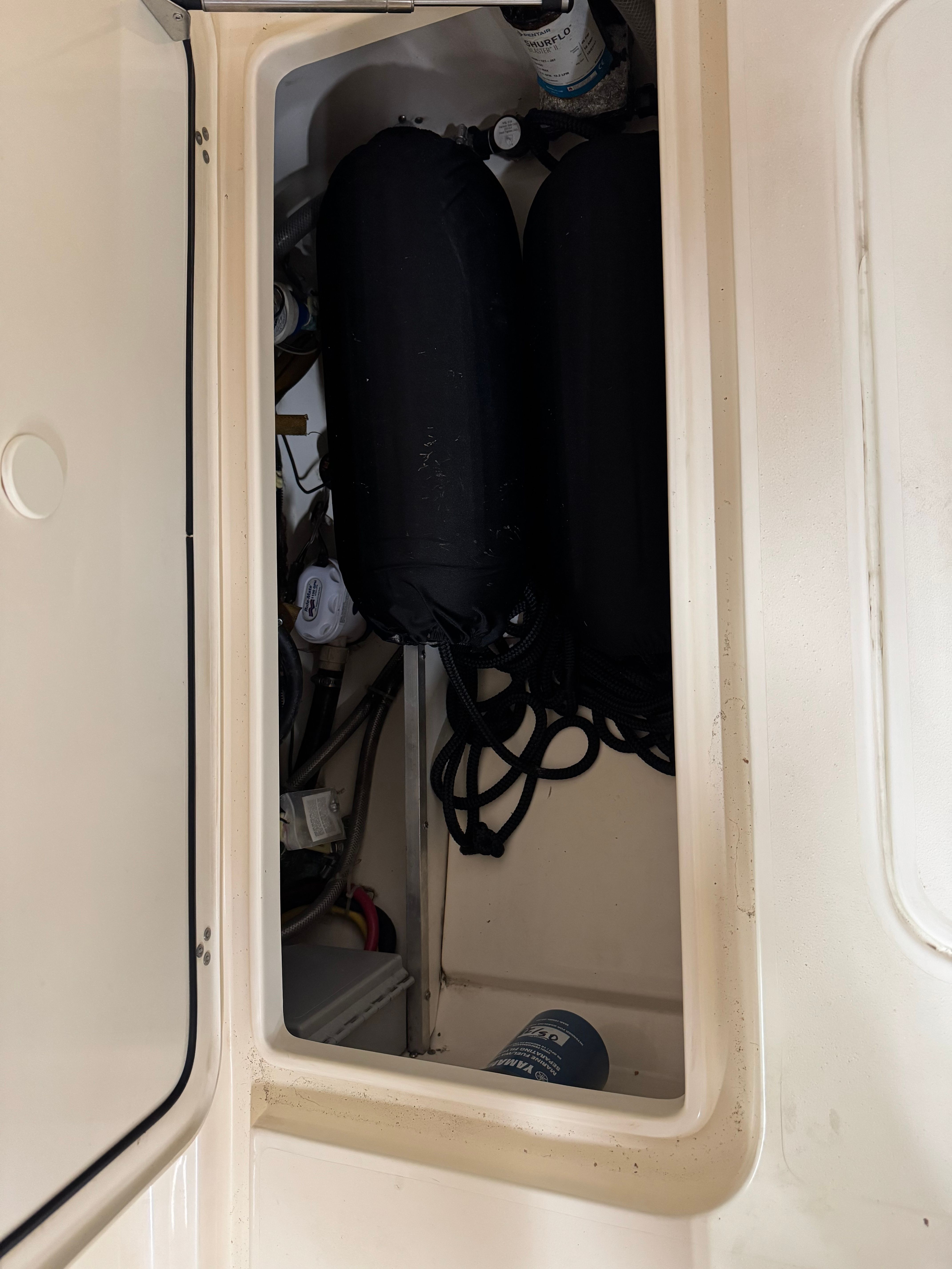 Storage compartment in 2020 Scout 235 XSF boat.