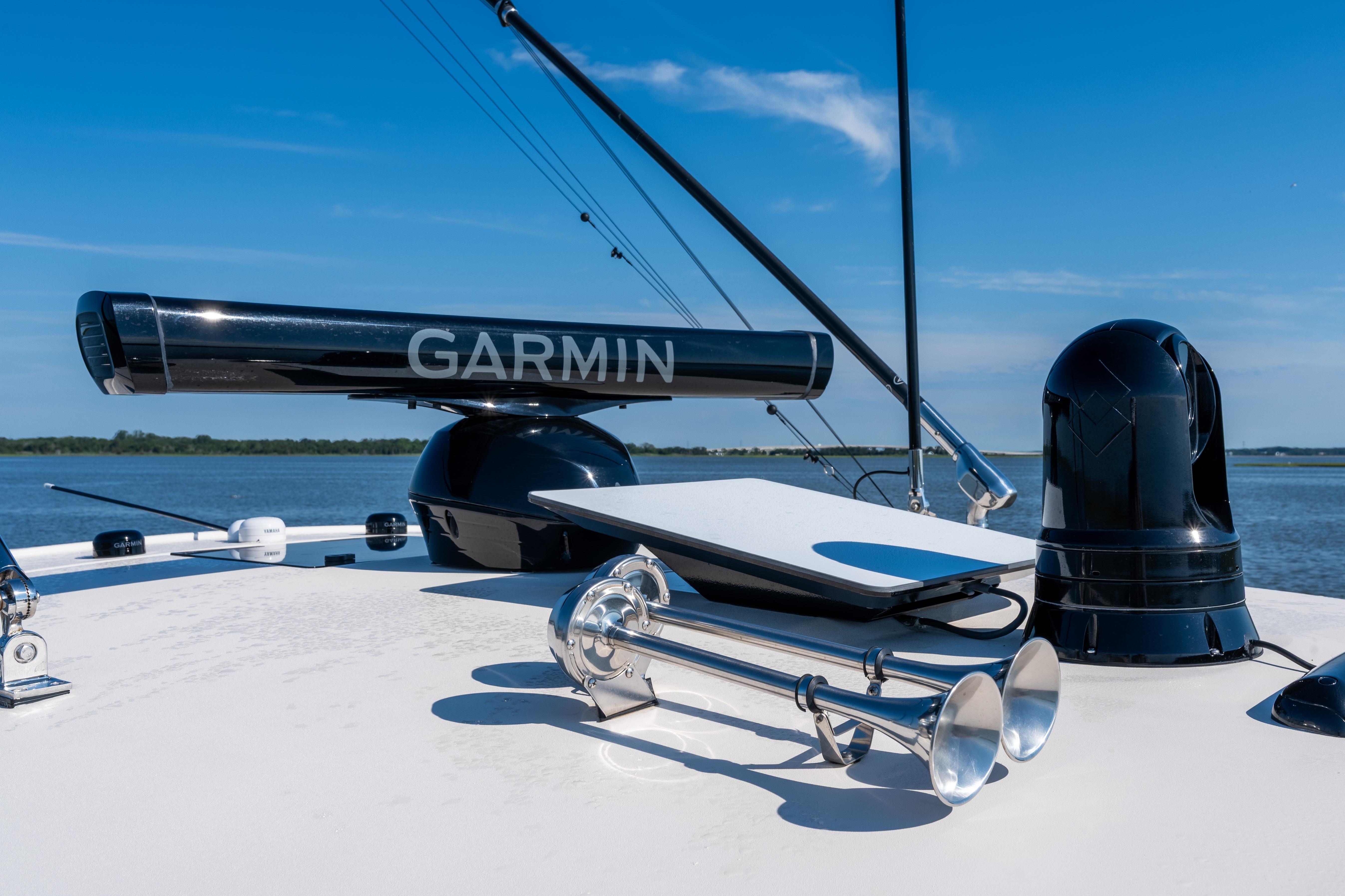 Grady-White Canyon 386 boat with Garmin radar, 2025 model, on a sunny day.