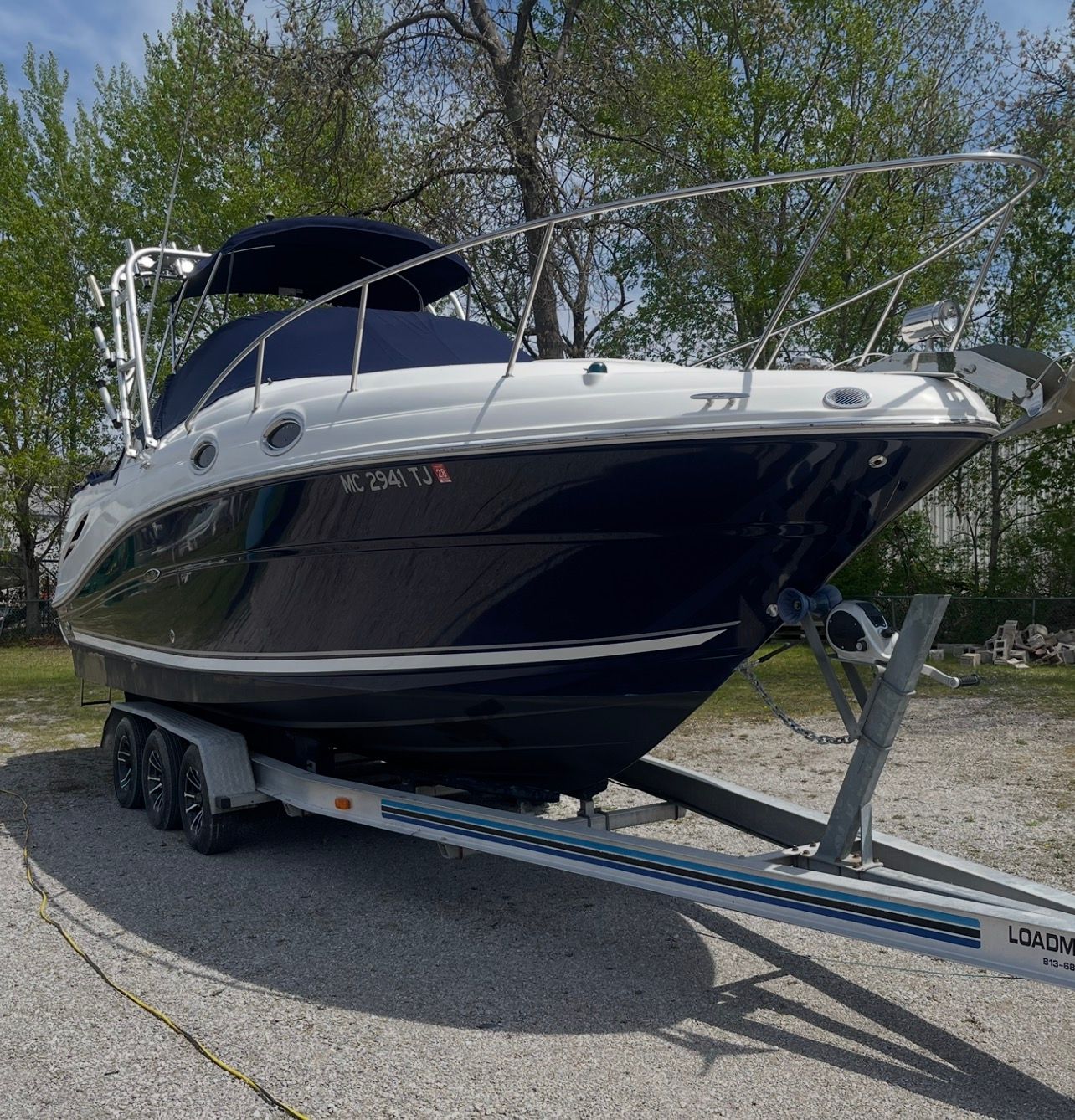 2006 Sea Ray 270 Amberjack on trailer, side view.