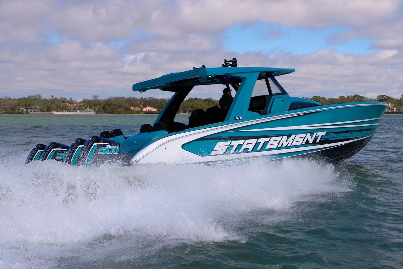 Manufacturer Provided Image: 2025 Statement 430 Tigress boat speeding on water, showcasing powerful engines and sleek design.