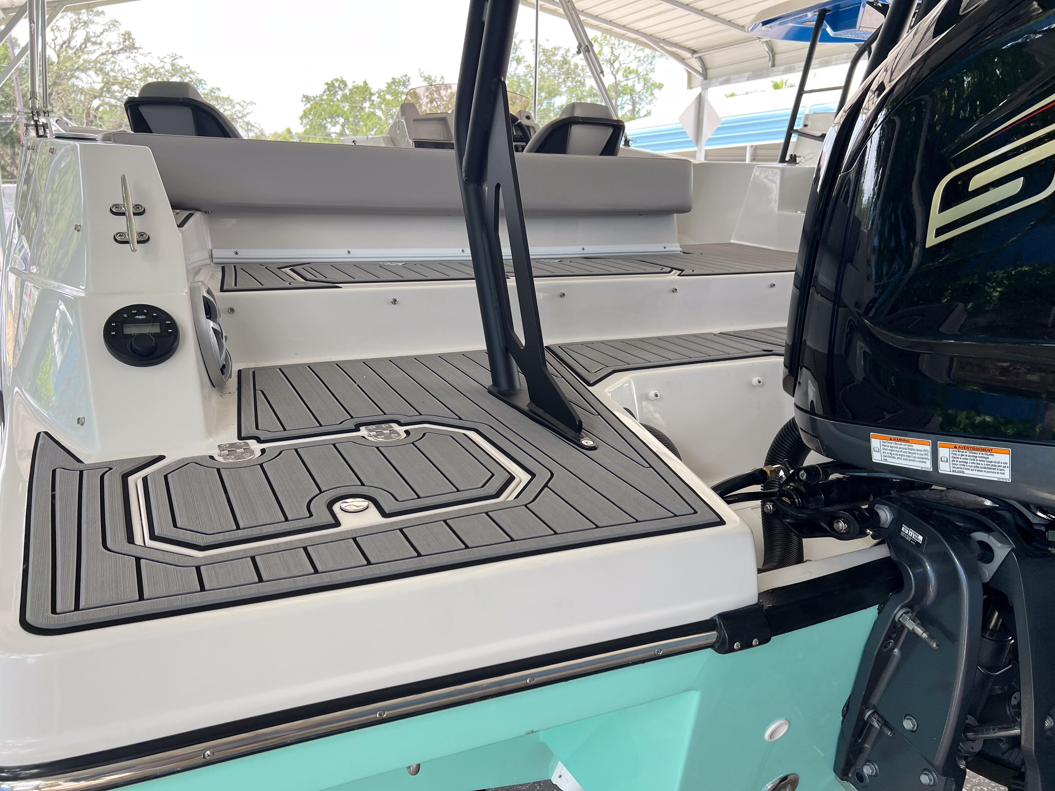 2026 Starcraft SVX 231 OB boat with sleek deck and powerful outboard motor.
