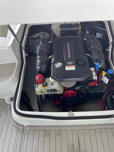 2019 Crownline E255 boat engine compartment with visible components and wiring.