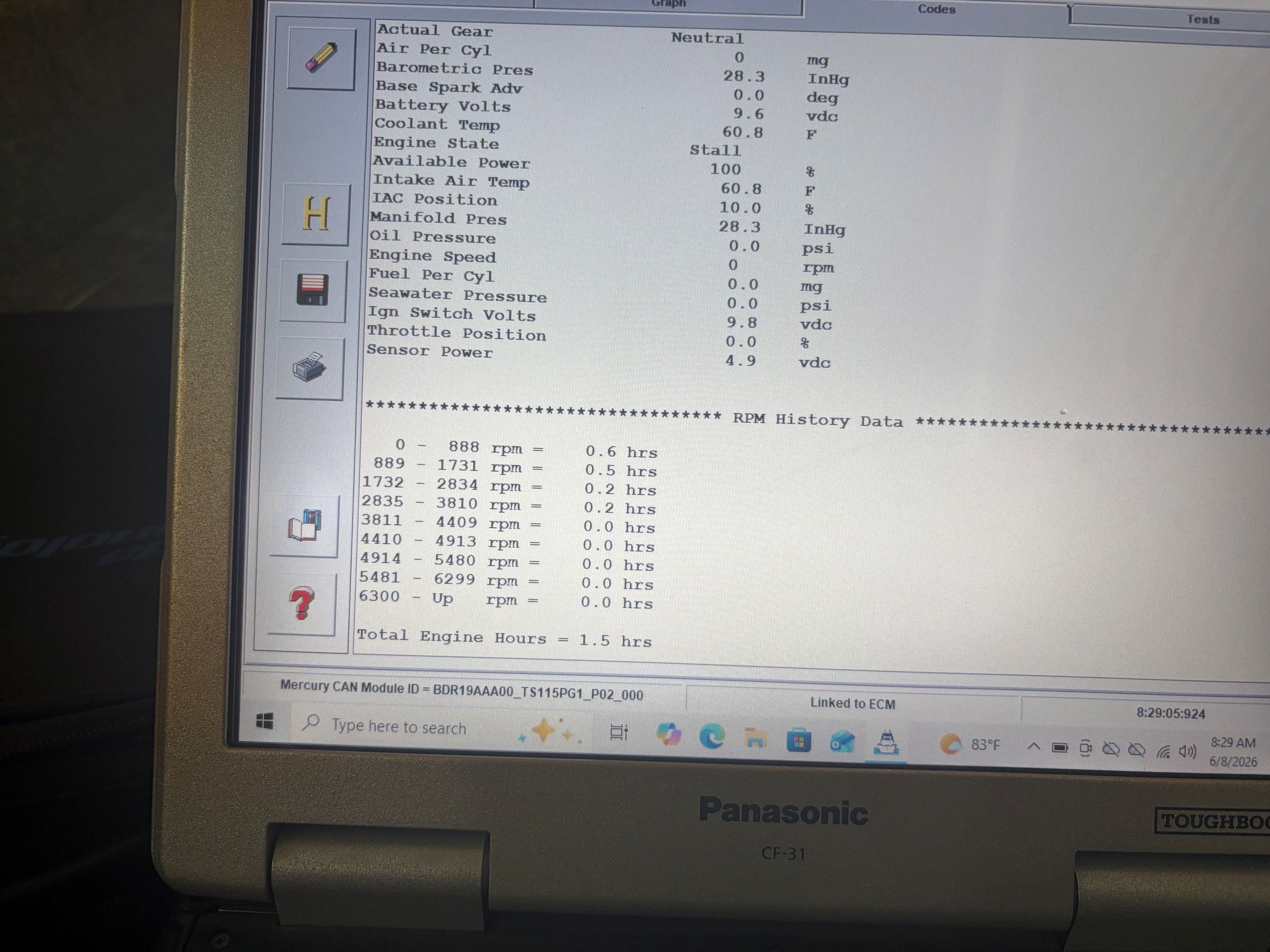 Panasonic Toughbook displaying engine performance data on screen.