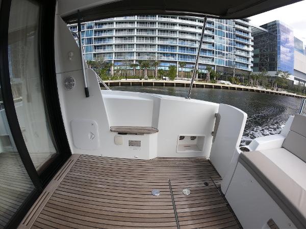 2017 Jeanneau NC 11 boat deck with waterfront view.