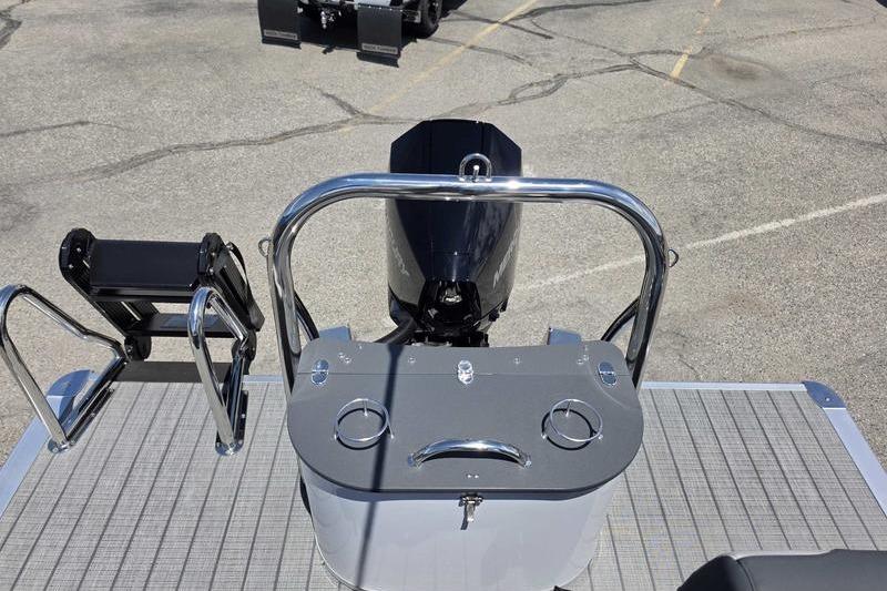2026 Avalon Catalina Quad Lounge Shift boat with motor and rear deck view.