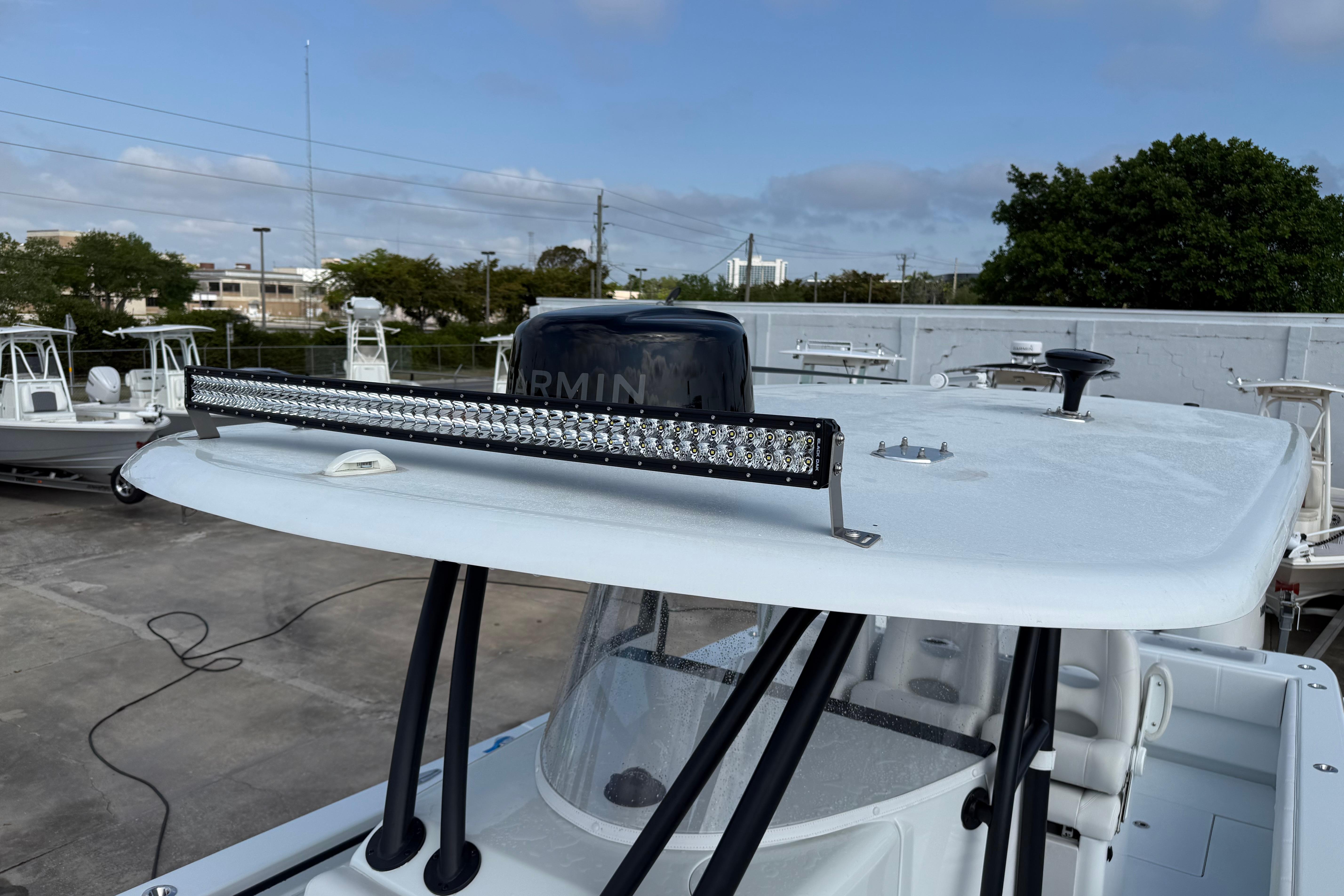 2026 Contender 39 ST boat with Garmin radar and LED light bar on the roof.