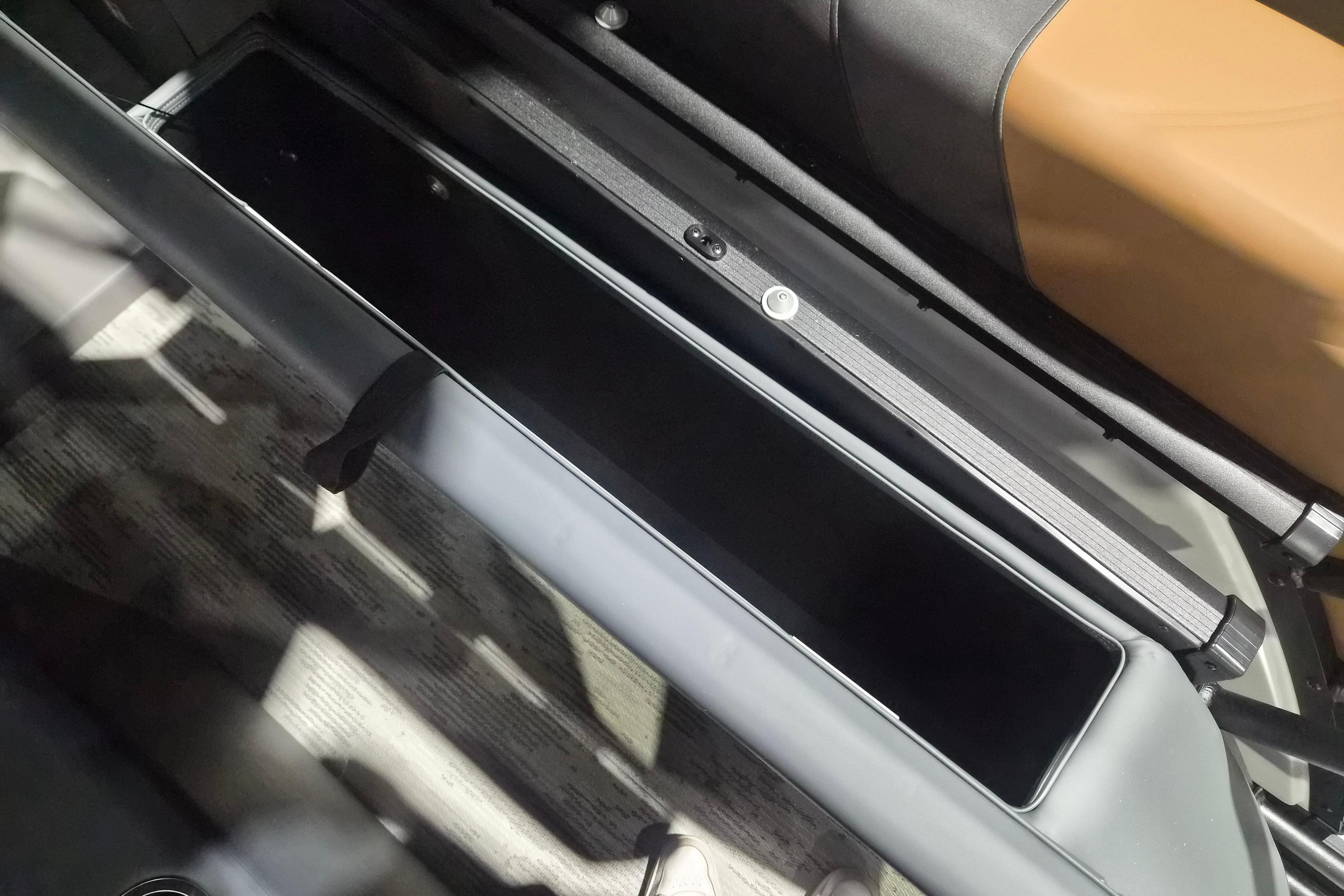 Interior storage compartment of 2026 Sylvan L3 ULZ boat, featuring sleek design and ample space.