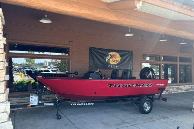 2026 Tracker Pro Guide V-16 SC boat displayed at Bass Pro Shops.