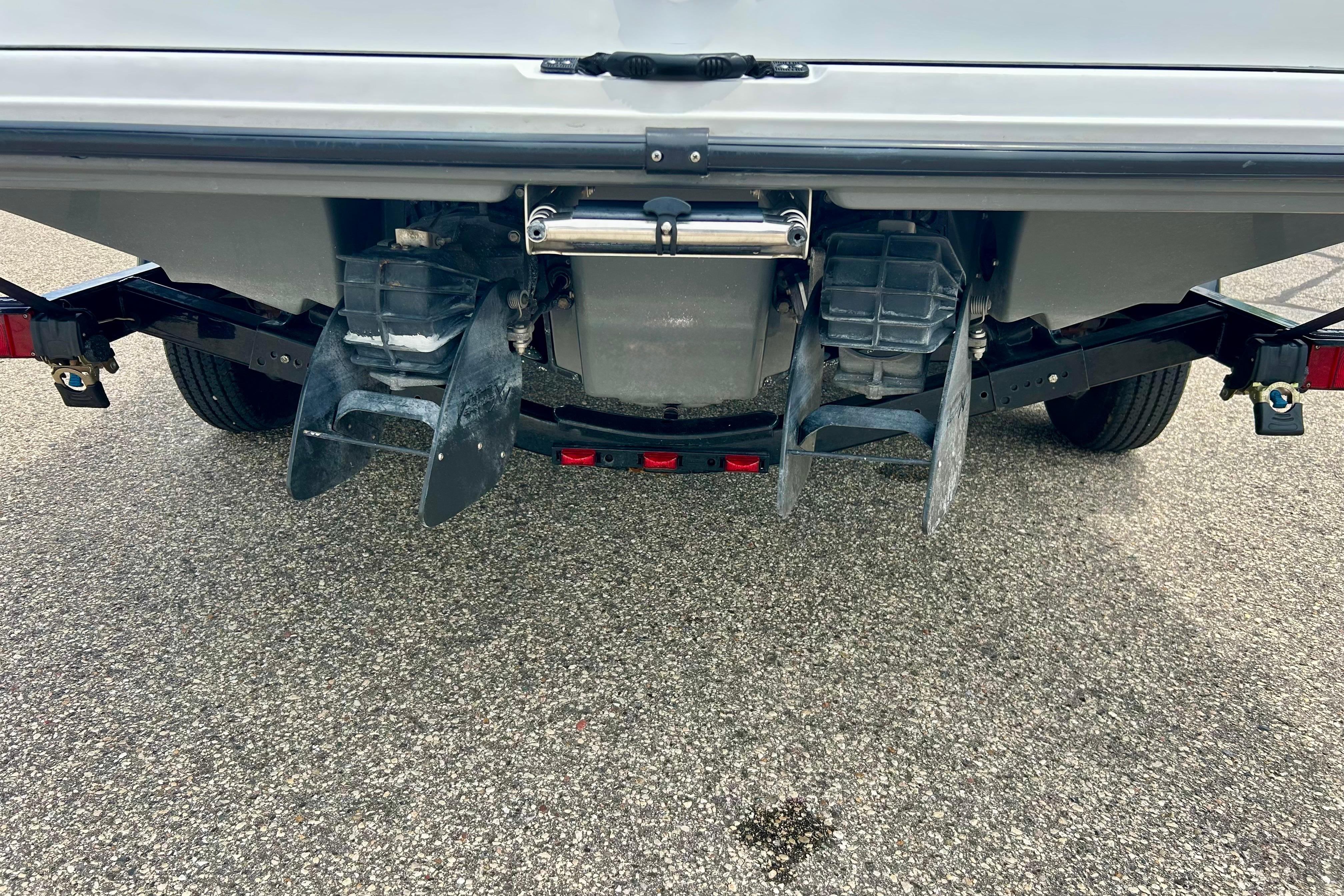 Rear view of a 2015 Yamaha Boats AR210 jet propulsion system on a trailer.