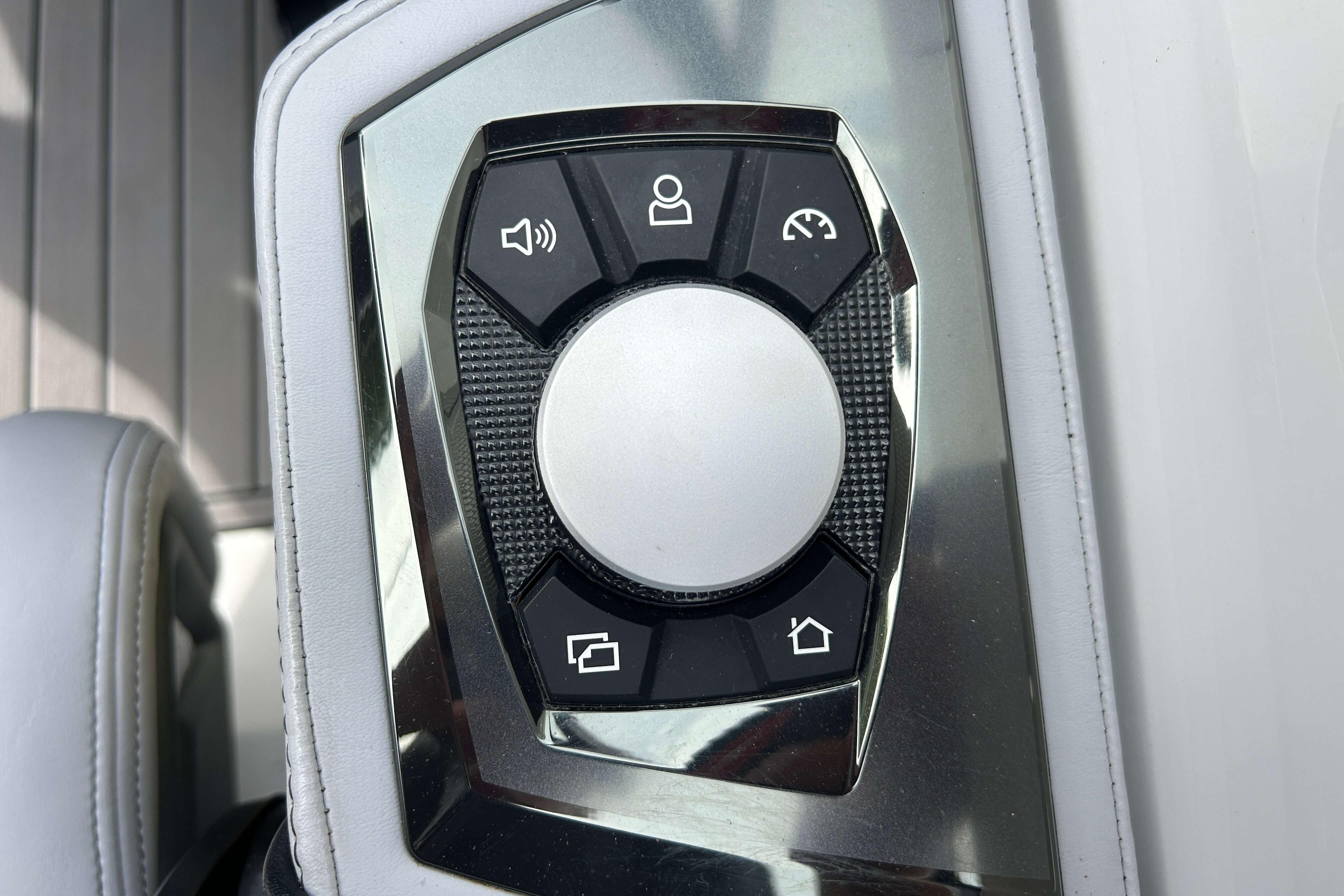 Control panel of 2021 Nautique Super Air Nautique GS24 boat with various function buttons.